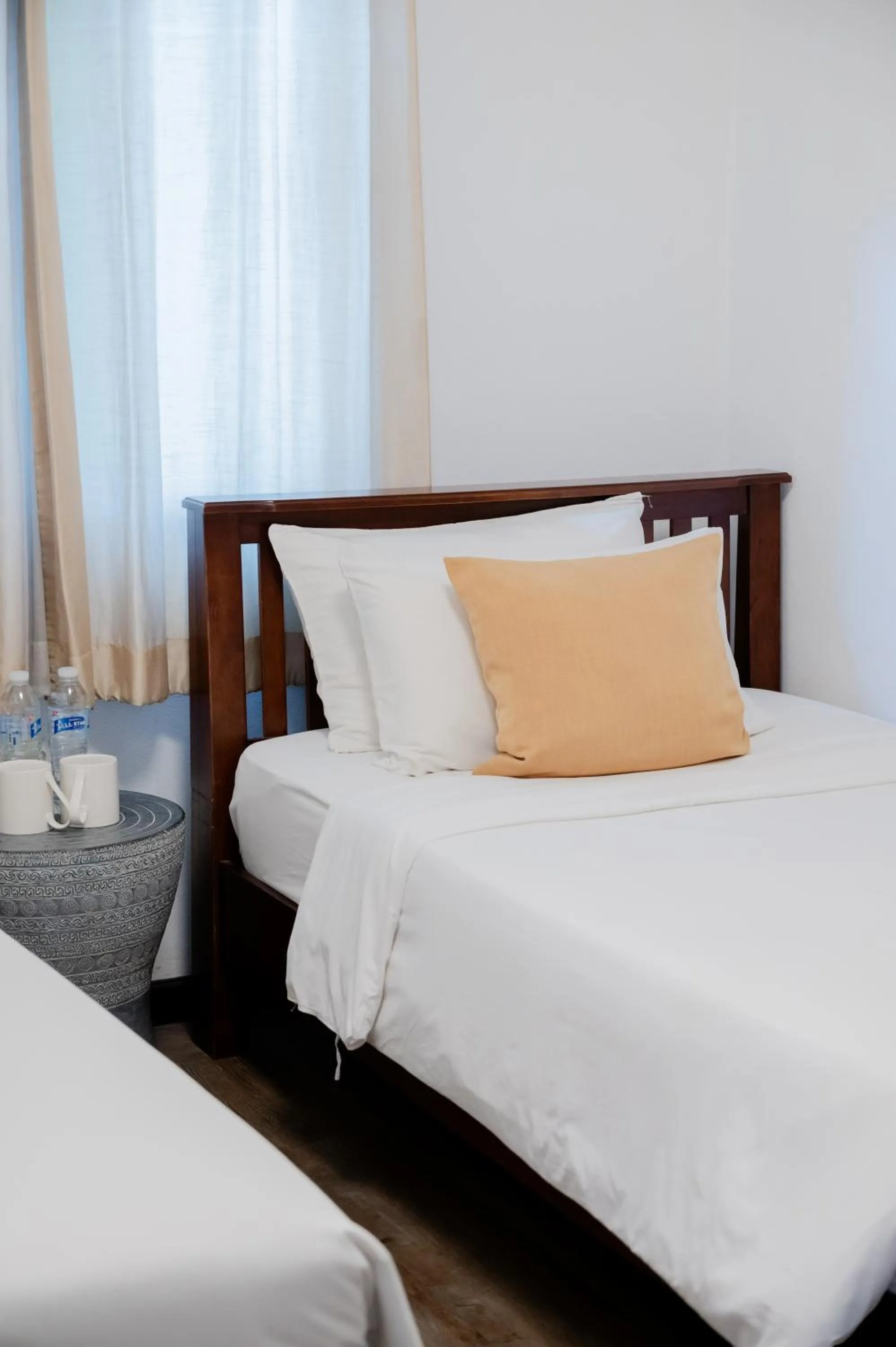 Bed in Tolani Southgate Villa Chiang Mai