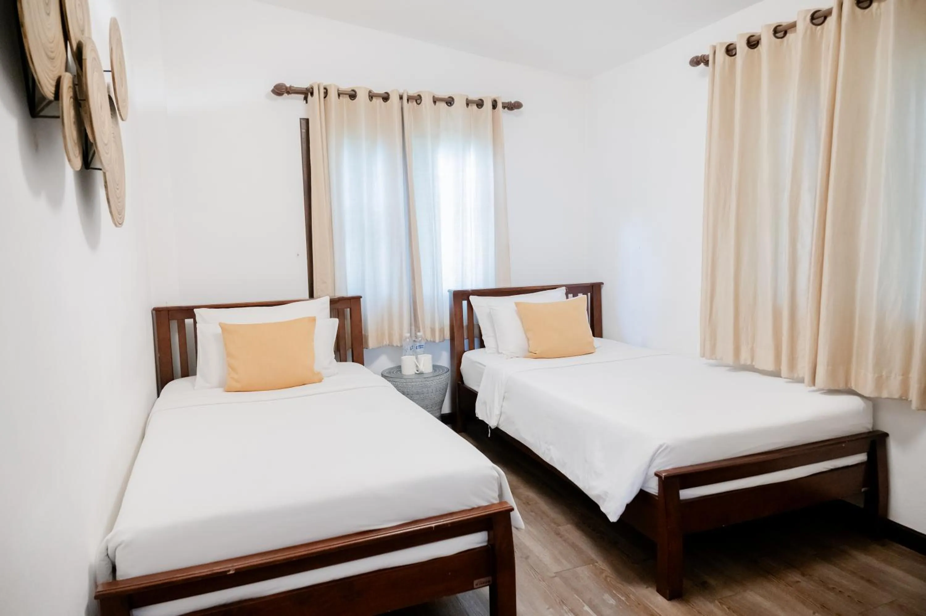 Bed in Tolani Southgate Villa Chiang Mai