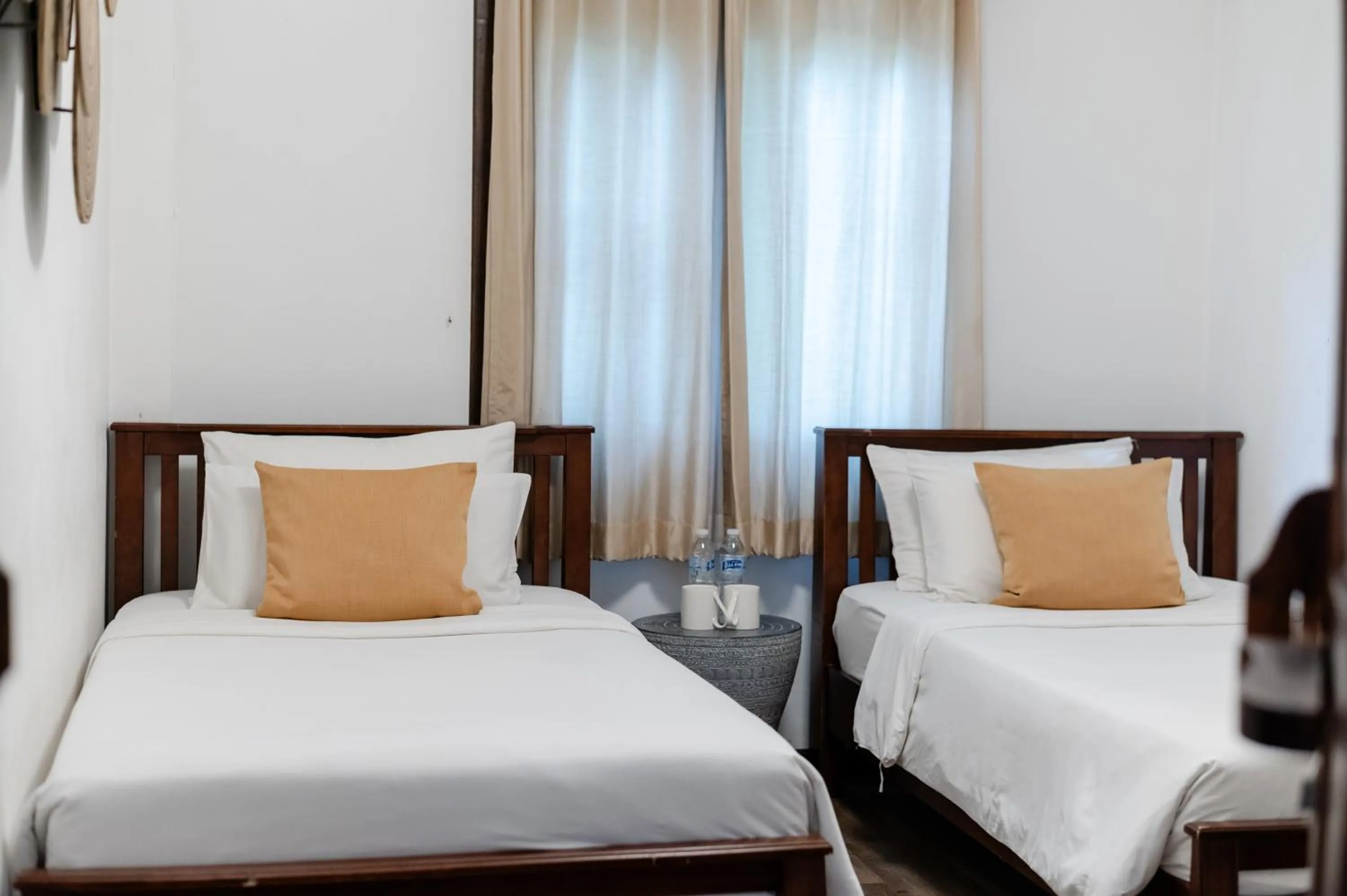 Bed in Tolani Southgate Villa Chiang Mai