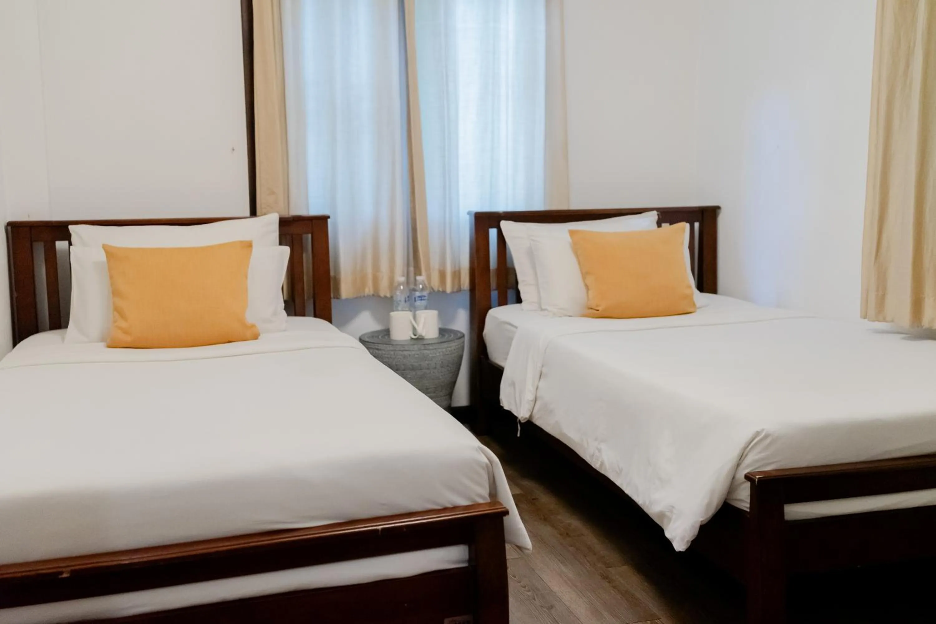 Bed in Tolani Southgate Villa Chiang Mai