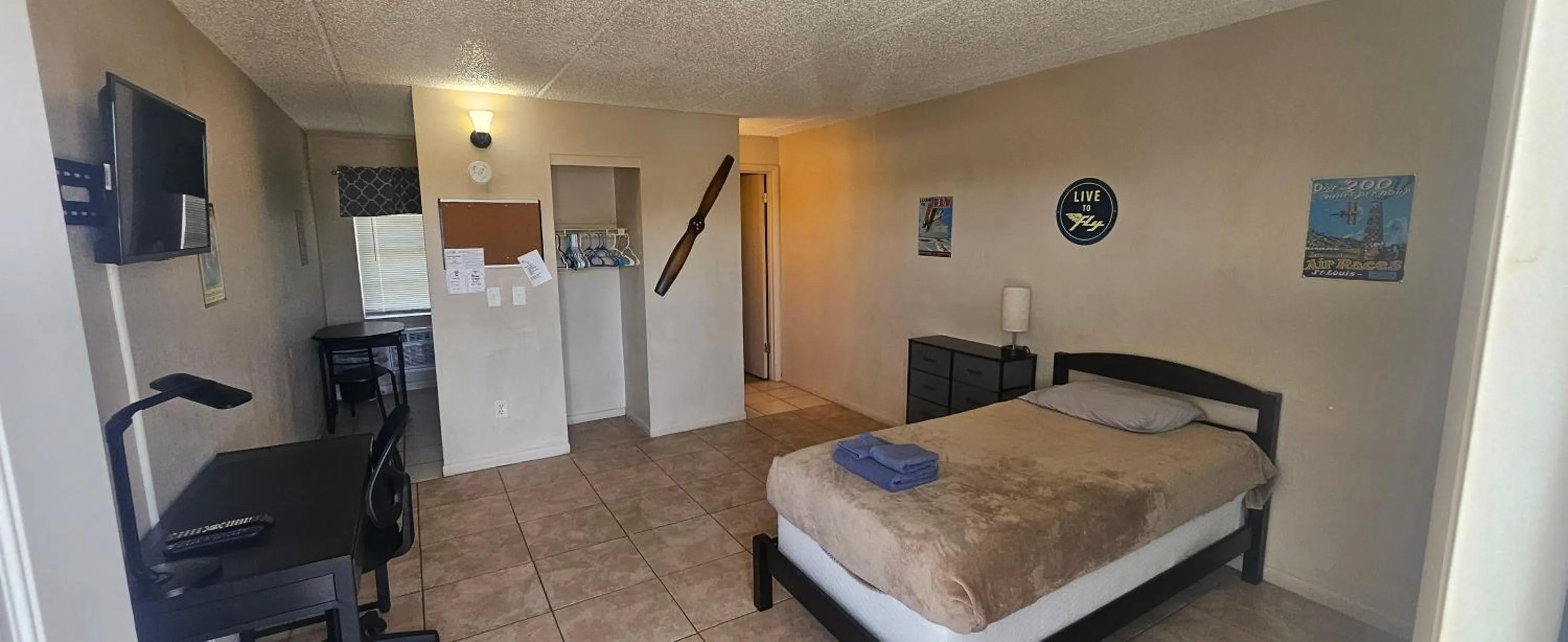 Bed in Sebastian Gardens Inn & Suites