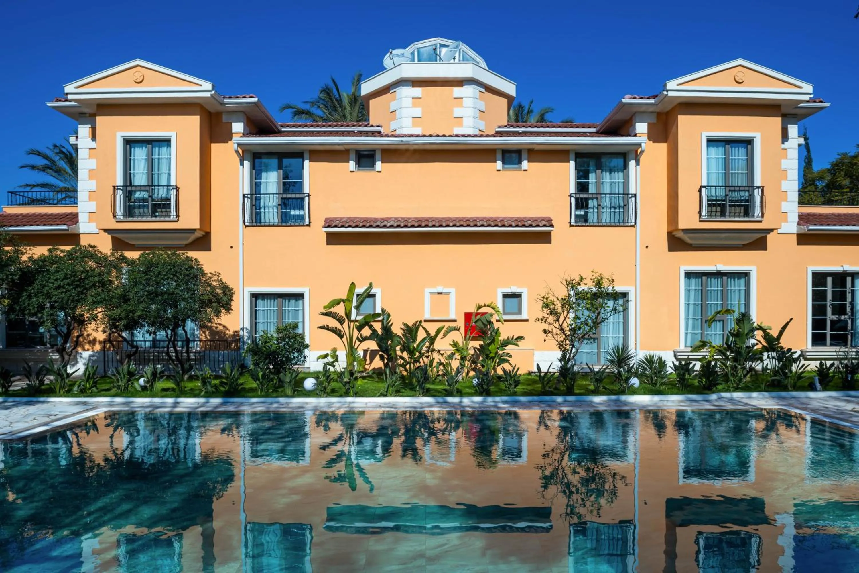 Property building in Ema Houses