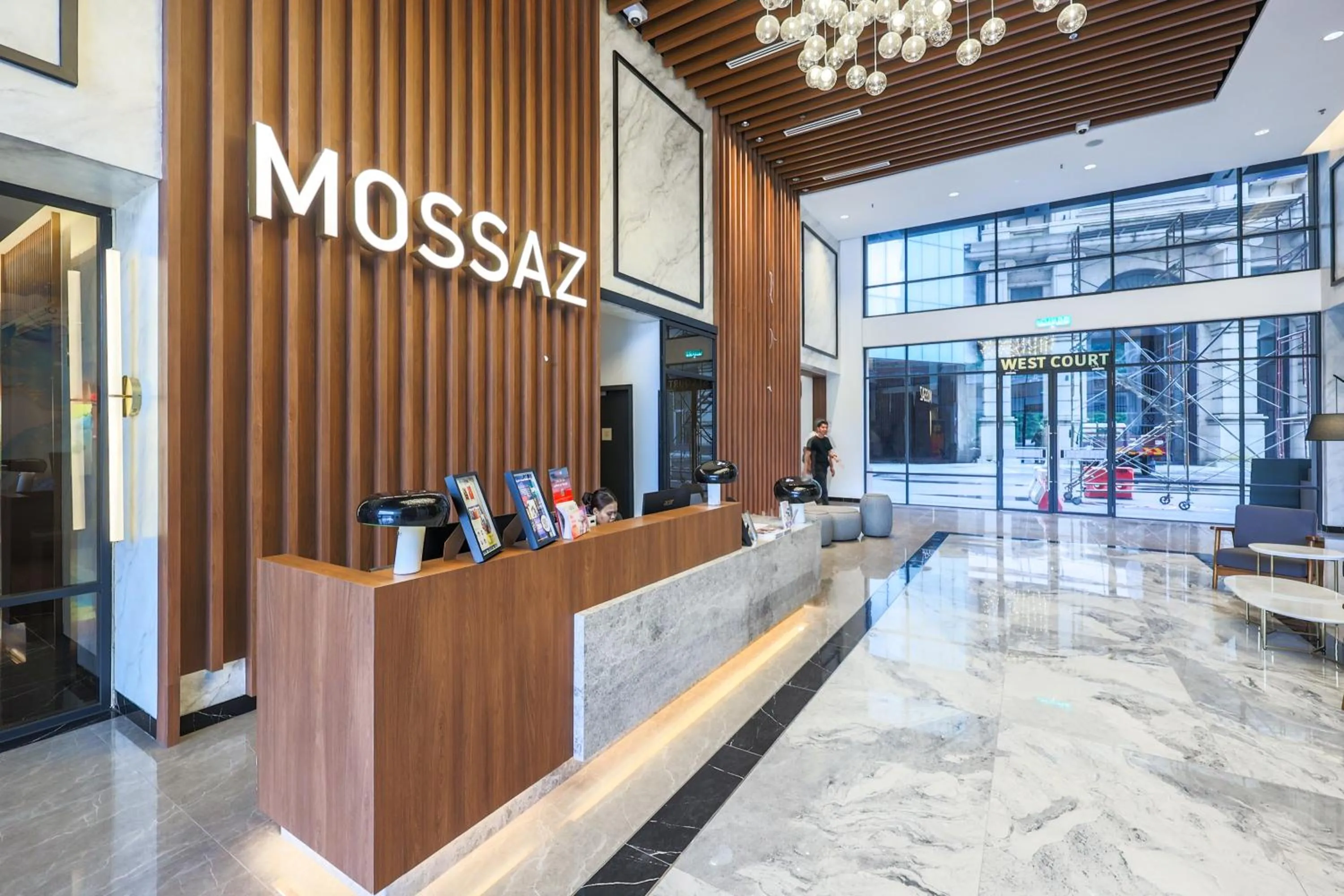 Lobby or reception in Mossaz Suites by MyKey