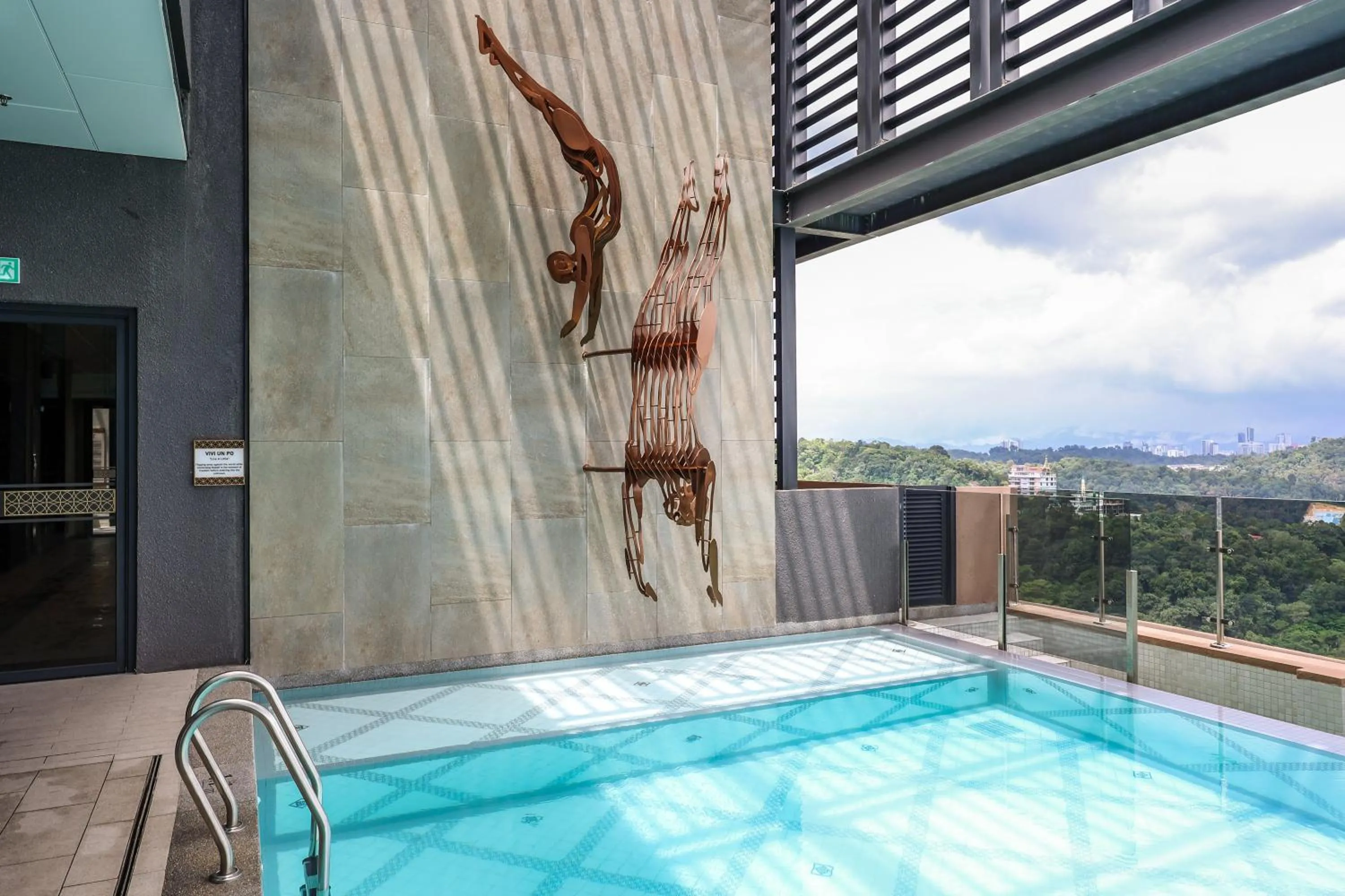 Swimming pool in Mossaz Suites by MyKey