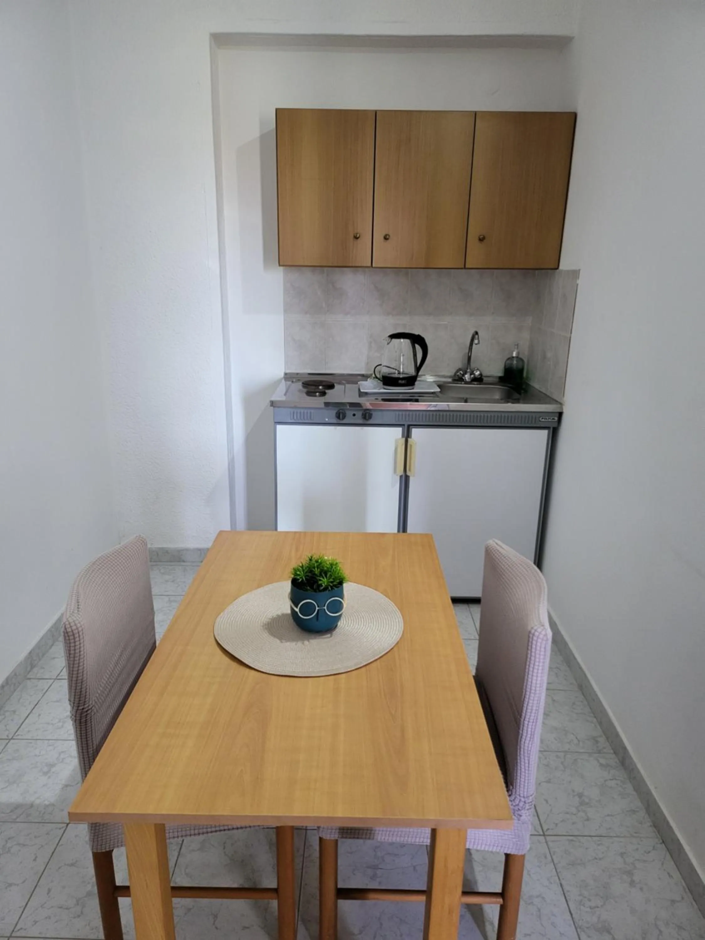 Kitchen or kitchenette in Pyrgos Hotel Apartments