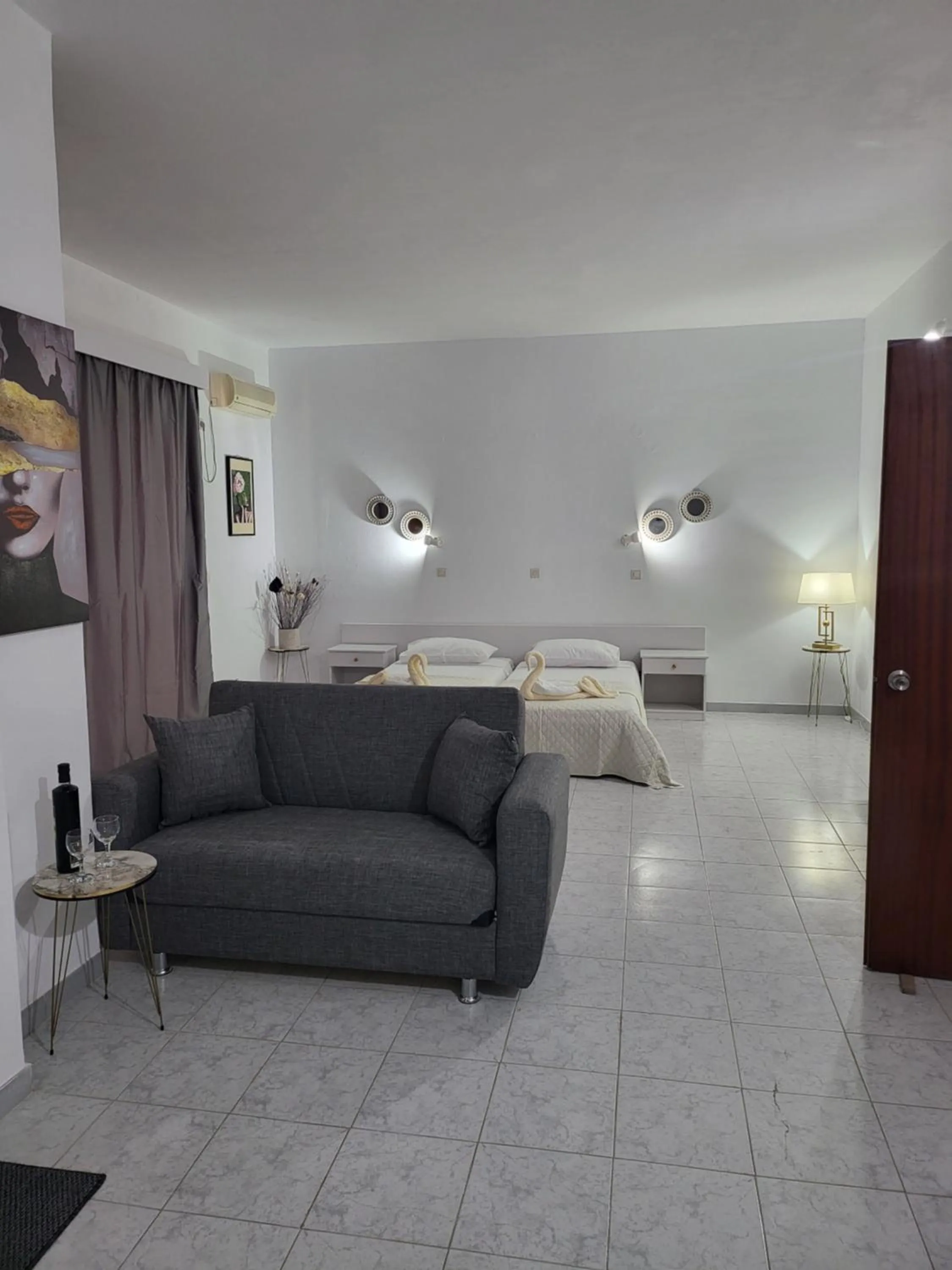 Bed in Pyrgos Hotel Apartments