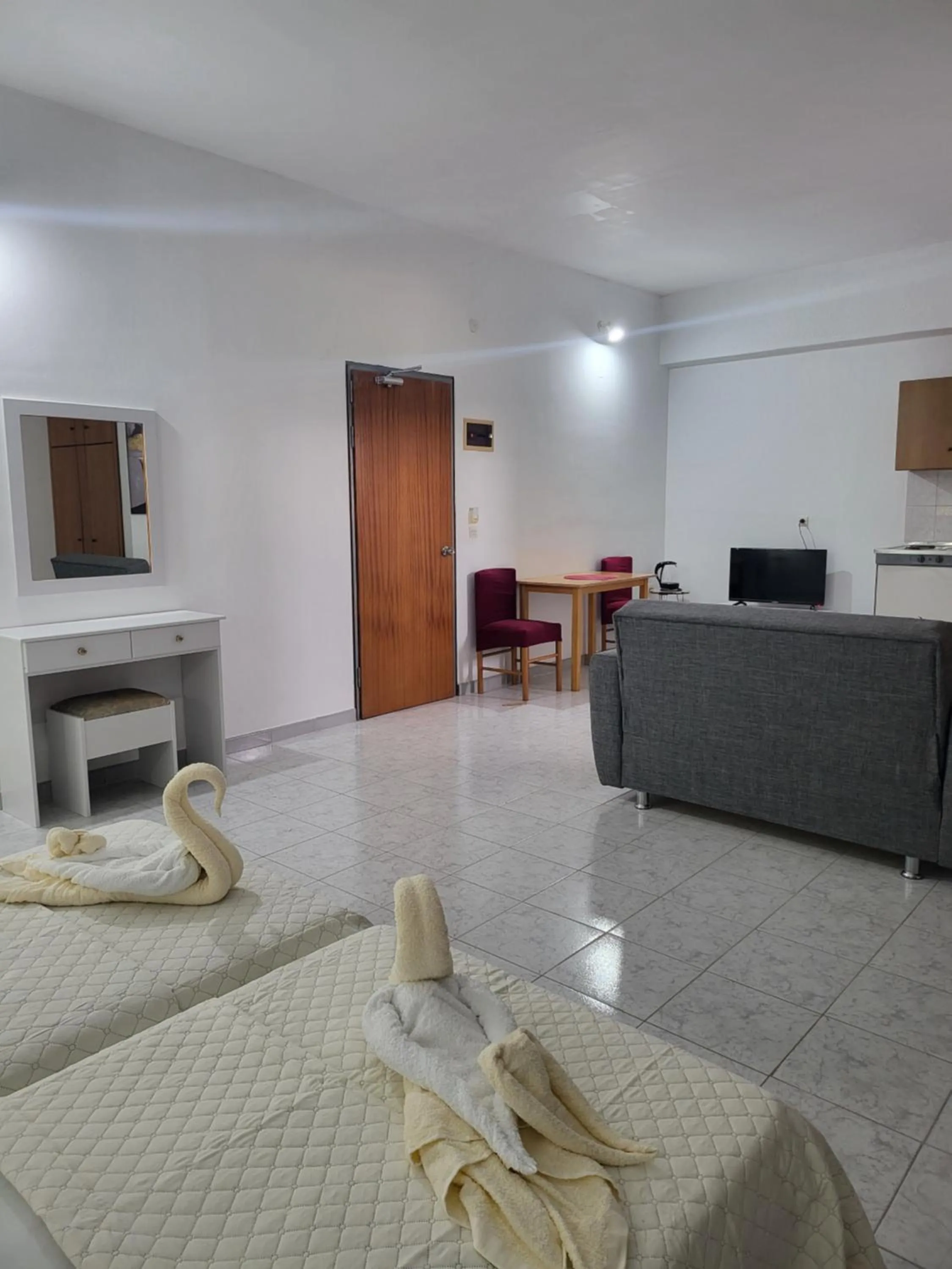 Bed in Pyrgos Hotel Apartments