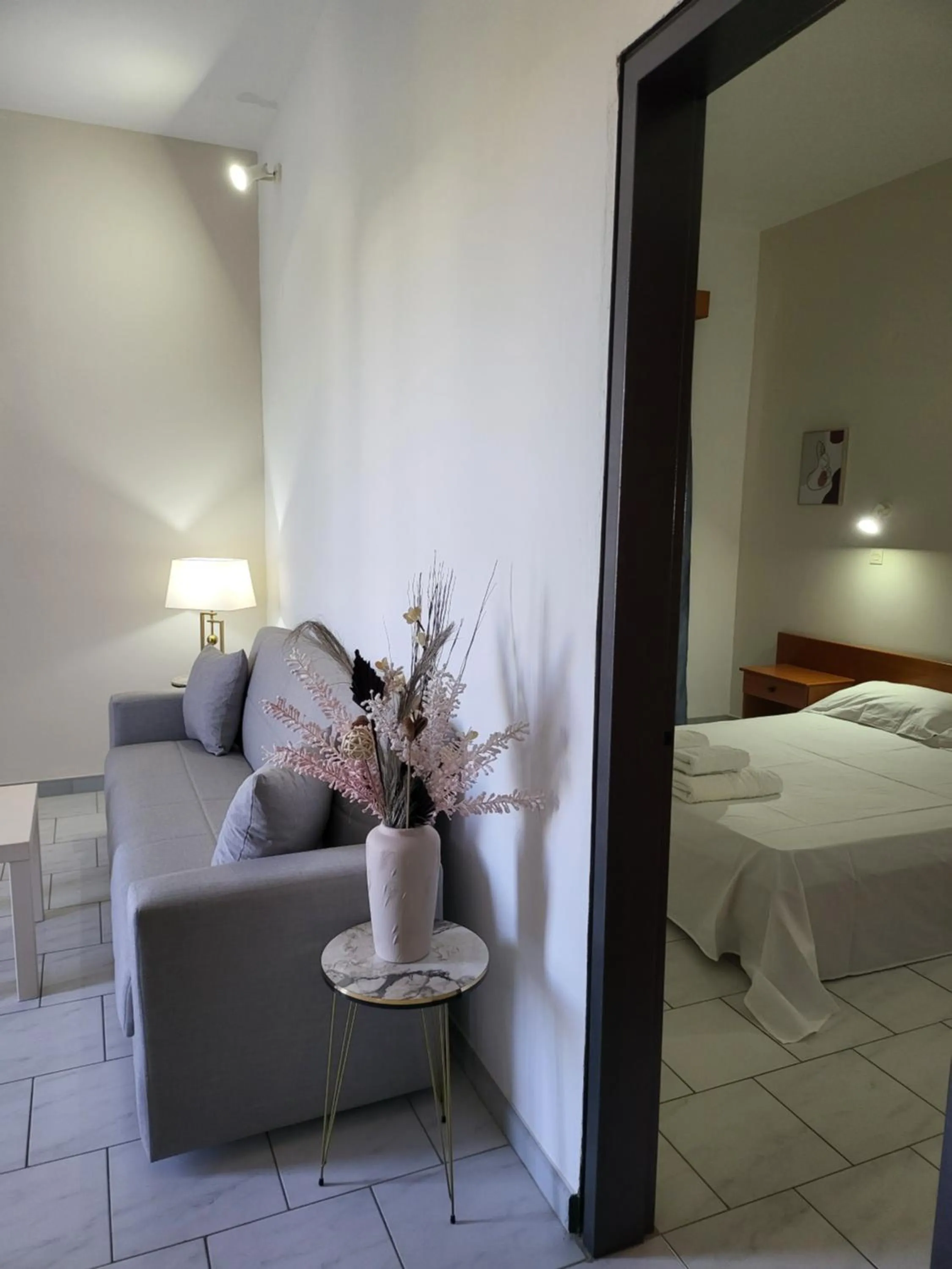 Bed in Pyrgos Hotel Apartments