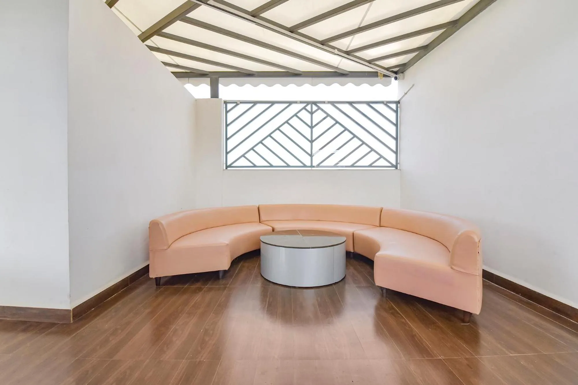 Seating area in FabHotel Prime The Grey Circle