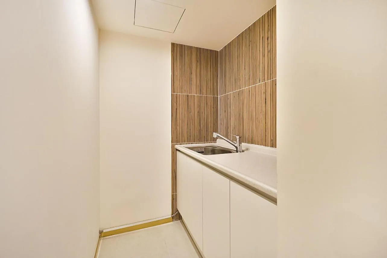 Kitchen or kitchenette in Denbasta Hotel Daeyeon