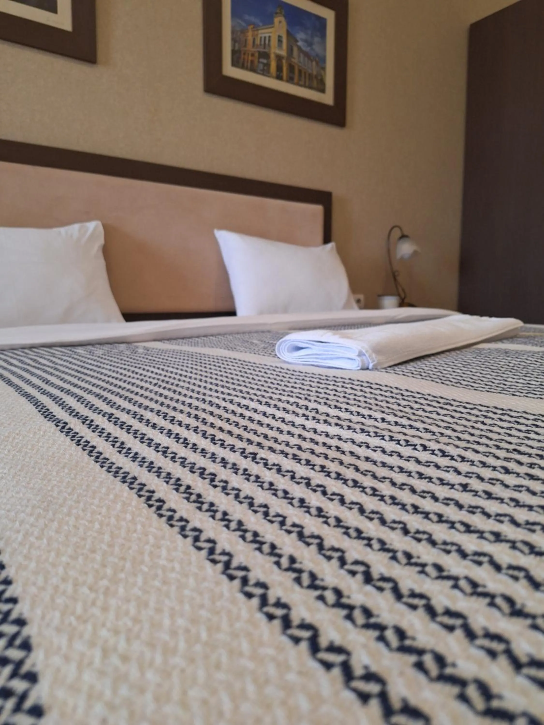 Bed in Garni Hotel Ema