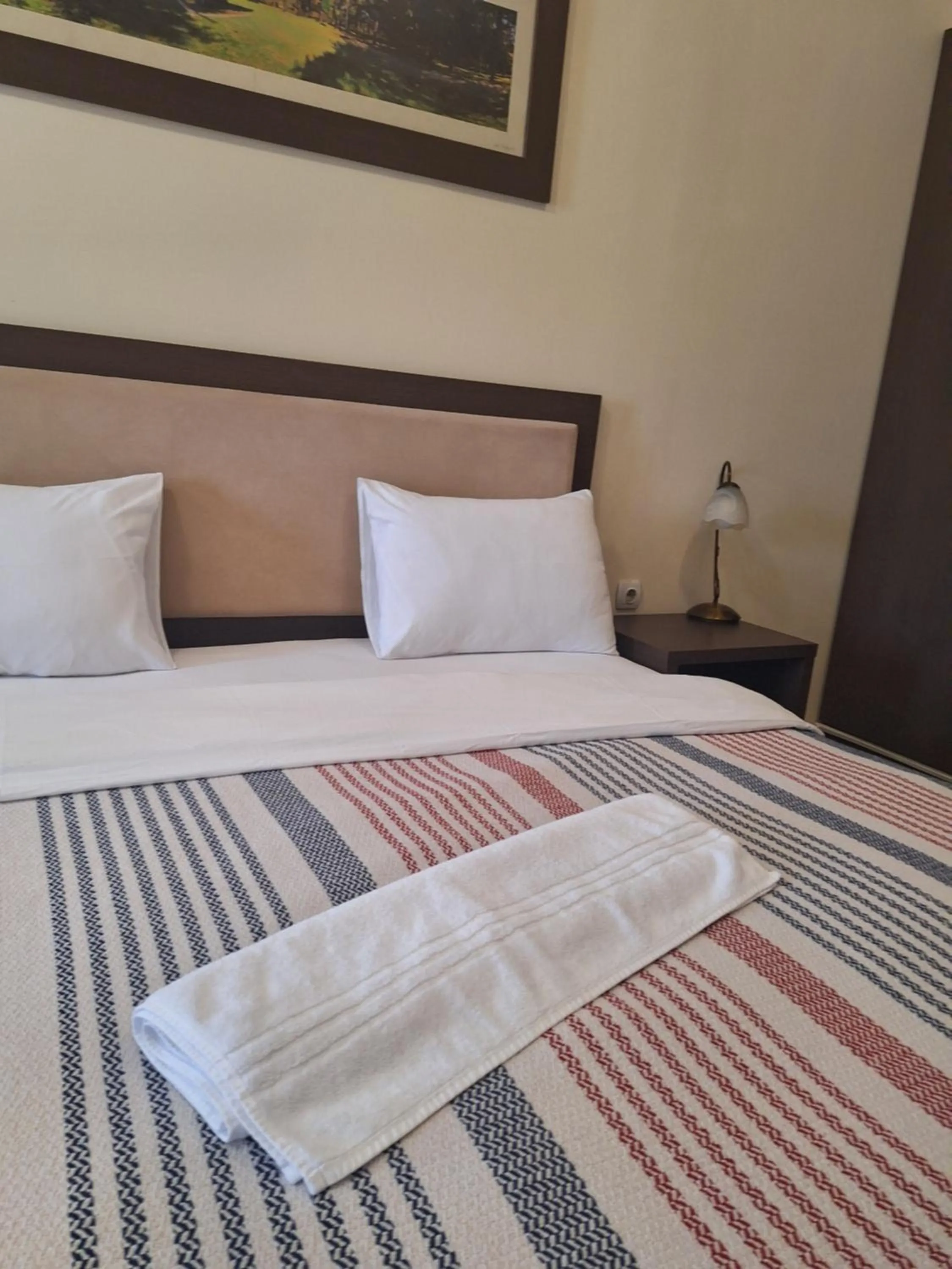 Bed in Garni Hotel Ema