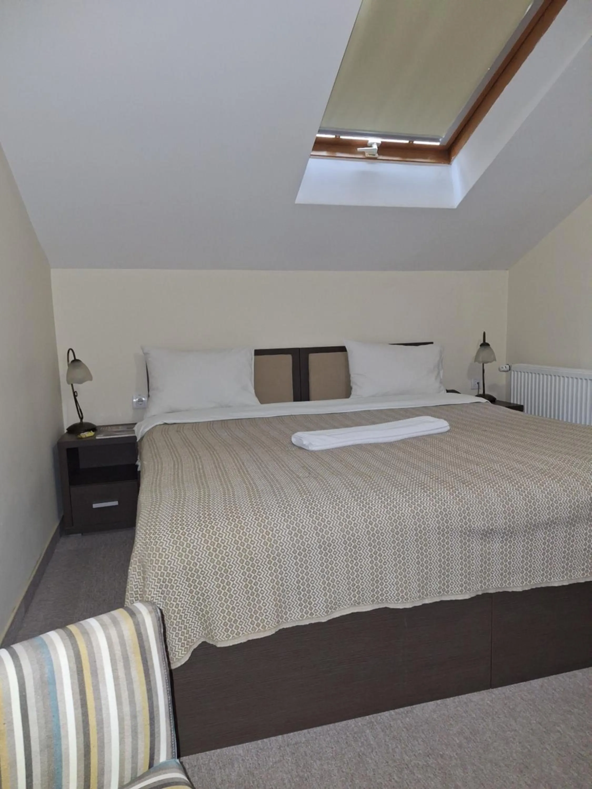 Bed in Garni Hotel Ema