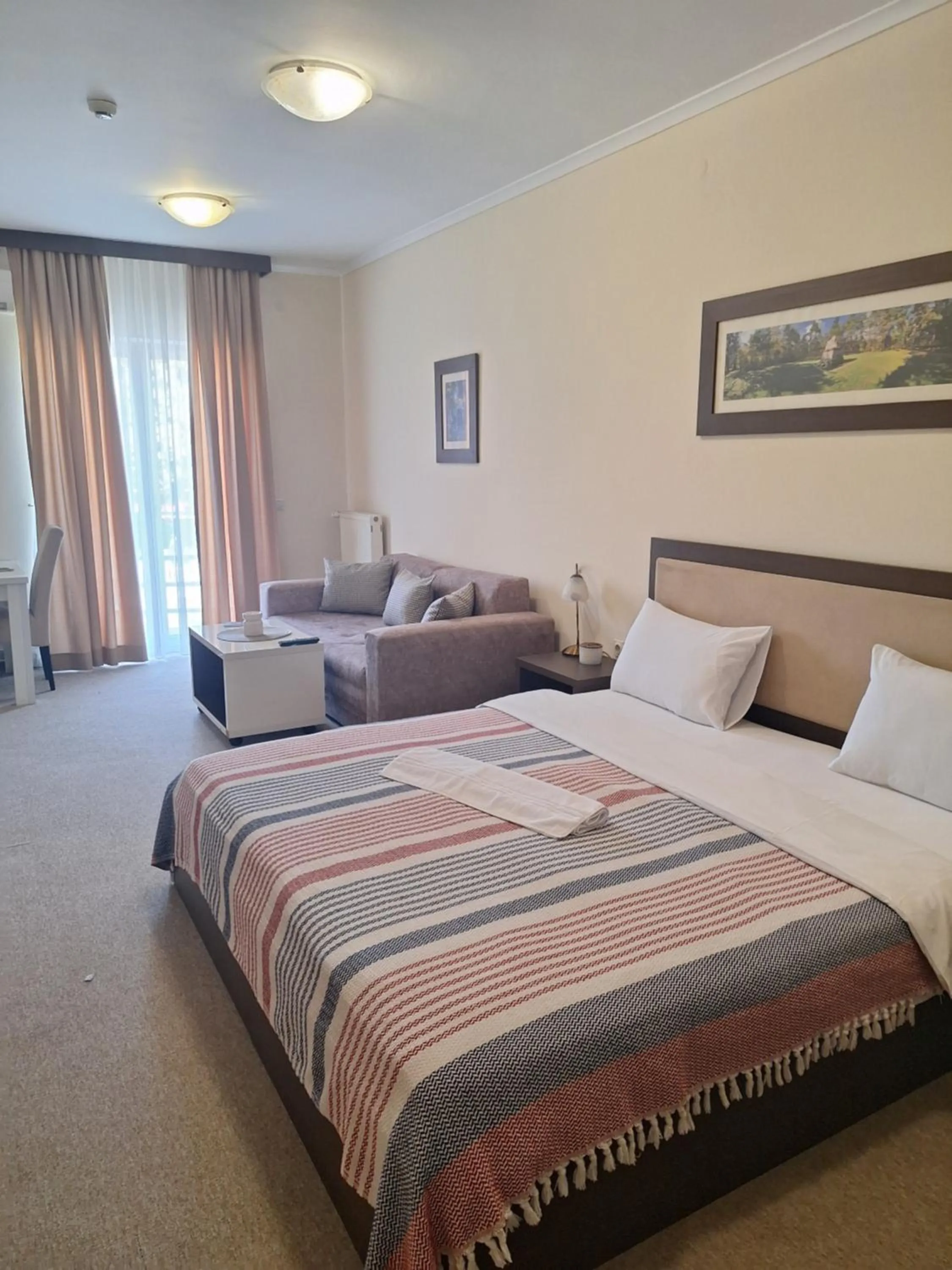 Bed in Garni Hotel Ema