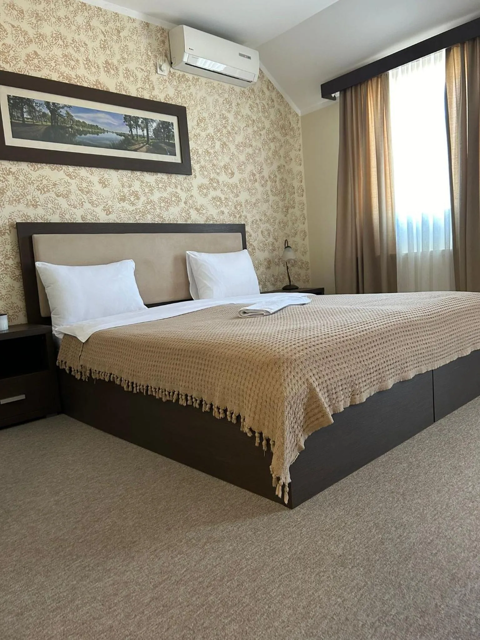 Bed in Garni Hotel Ema