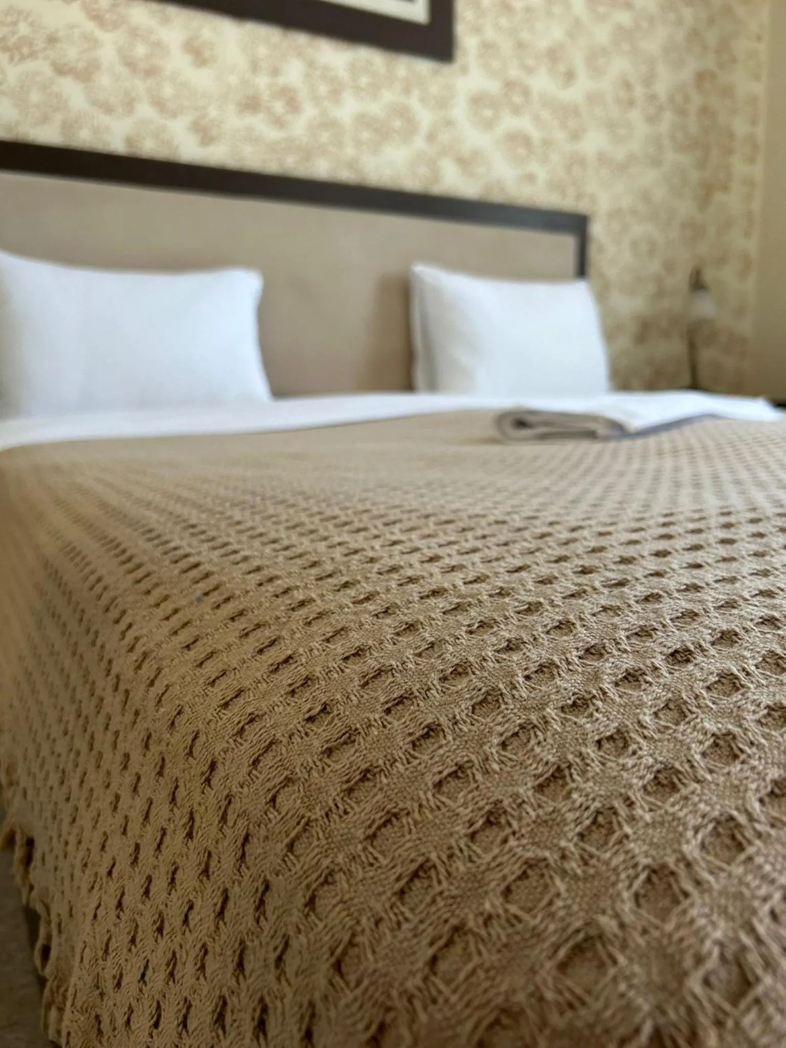 Bed in Garni Hotel Ema