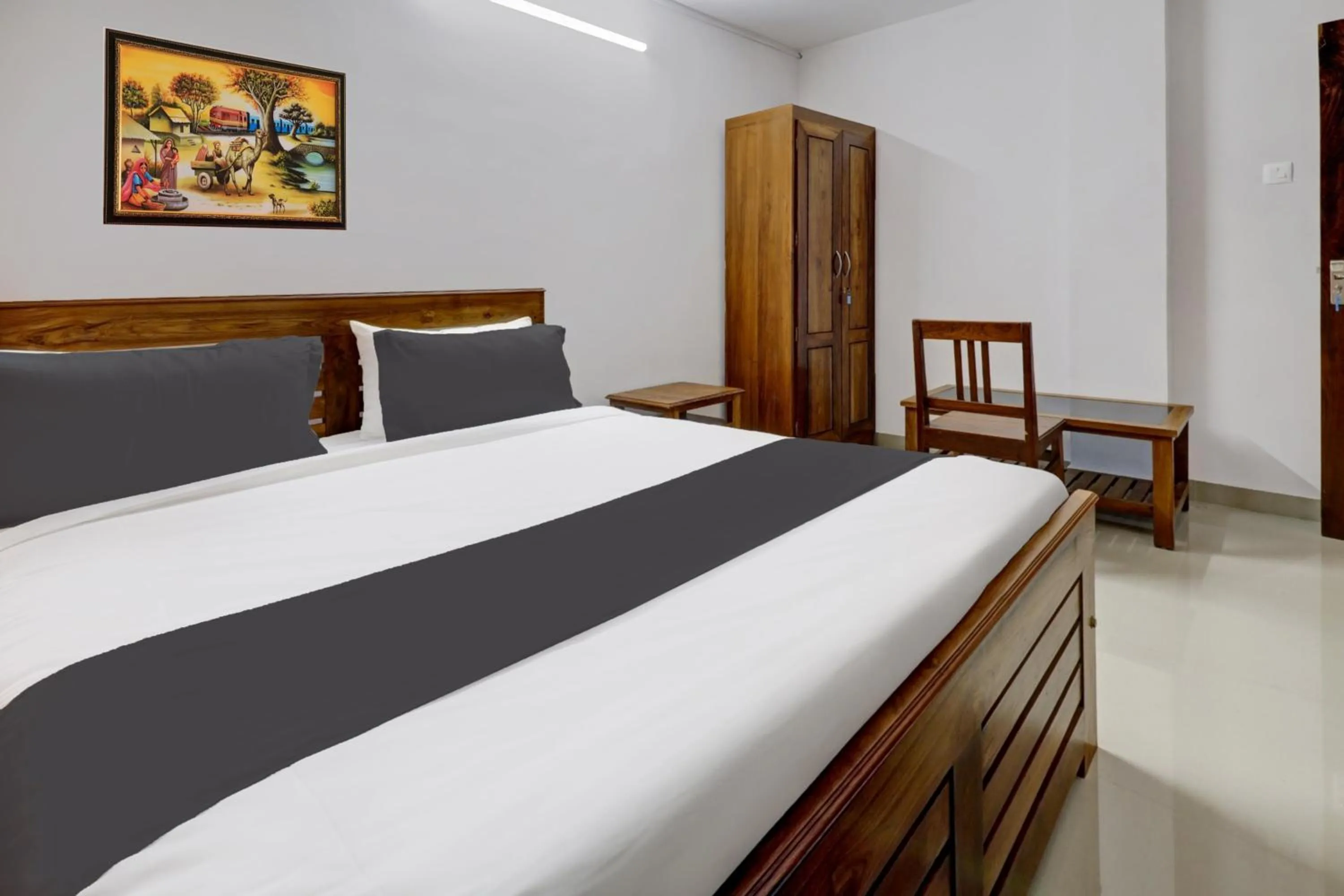 Bedroom, Bed in Super Hotel O Anayara Near Lulu Mall formerly Timber Residency