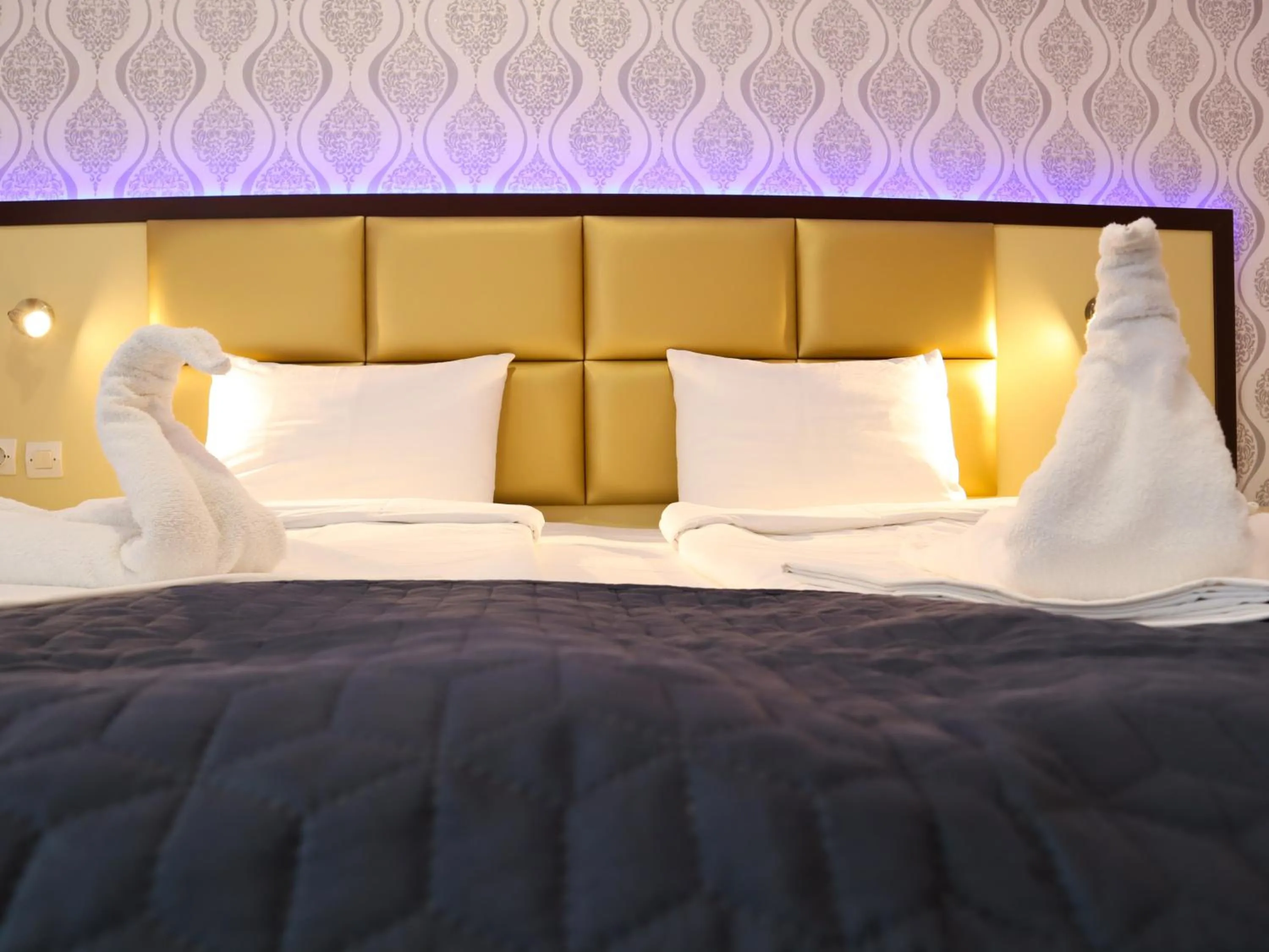 Bed in Sunset Paradise Resort