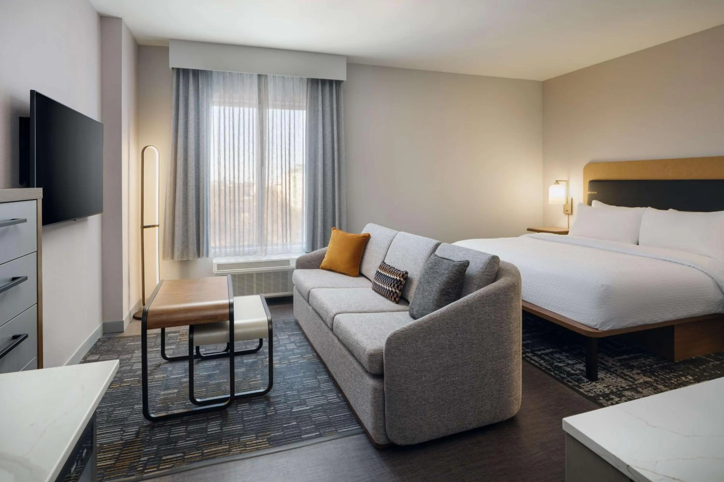 Living room, Bed in Homewood Suites By Hilton Raleigh Downtown