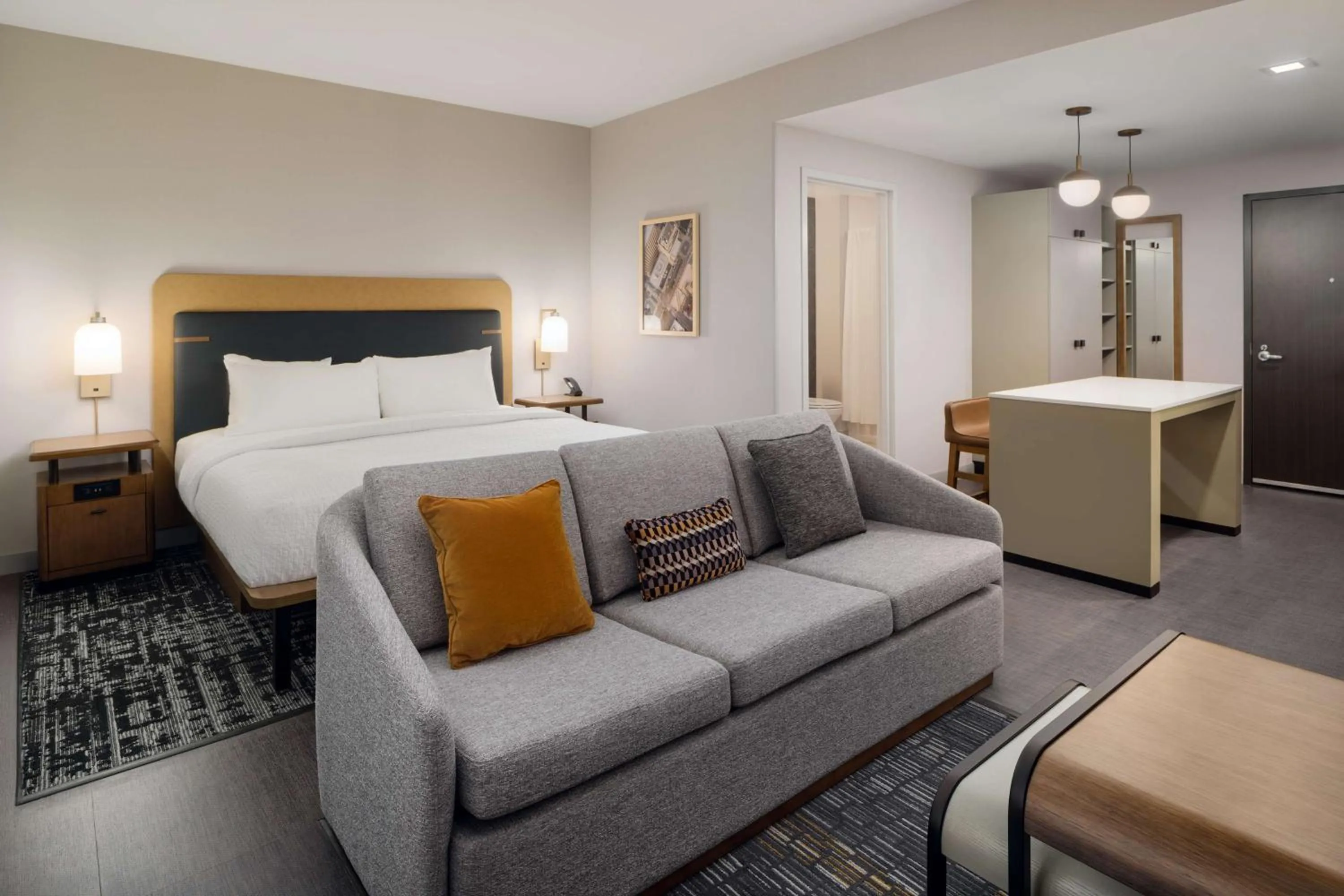 Bed in Homewood Suites By Hilton Raleigh Downtown