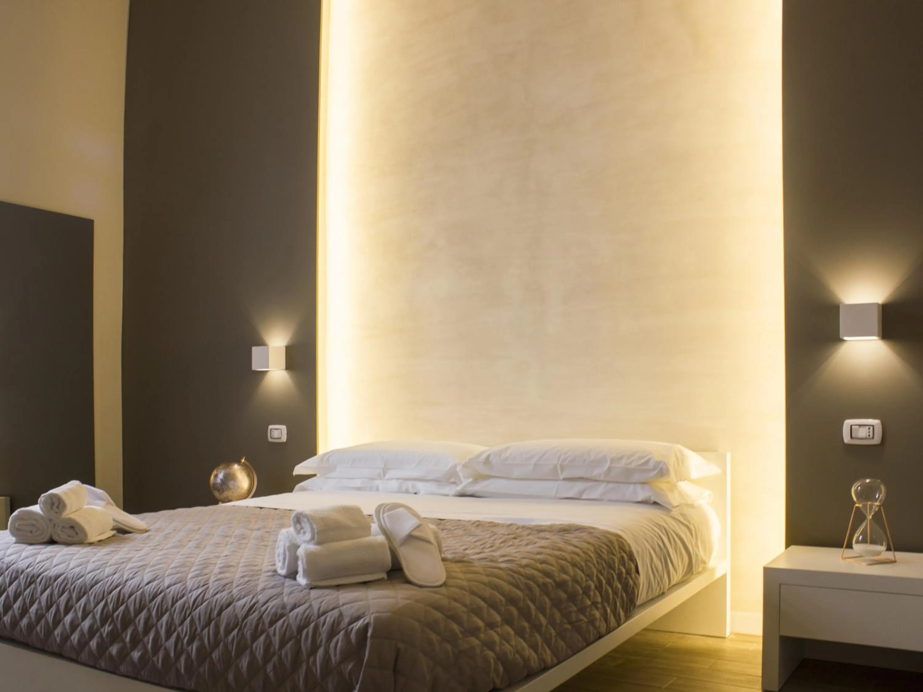 Bed in La Banchina Holiday Rooms