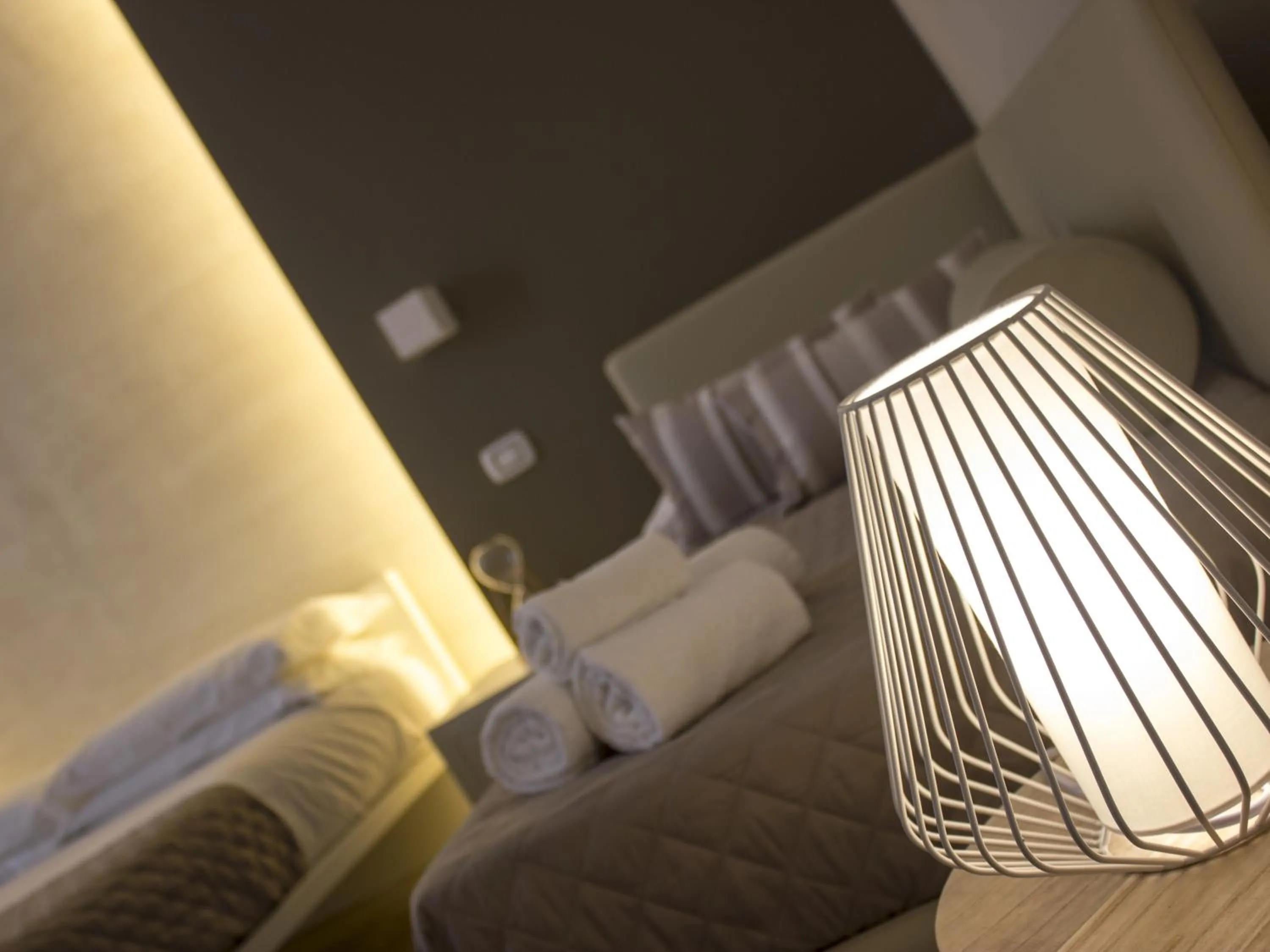 Bed in La Banchina Holiday Rooms