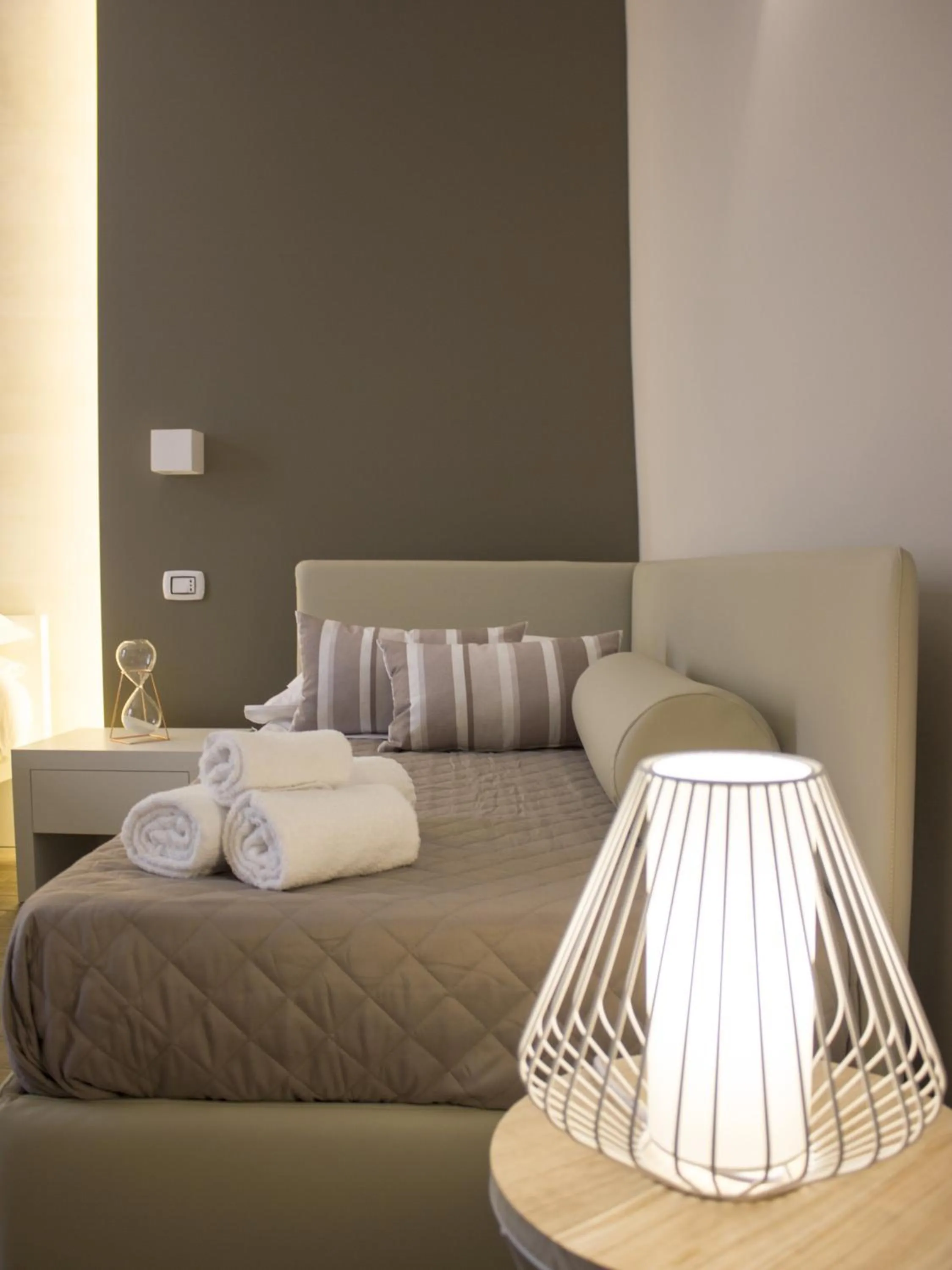 Bed in La Banchina Holiday Rooms