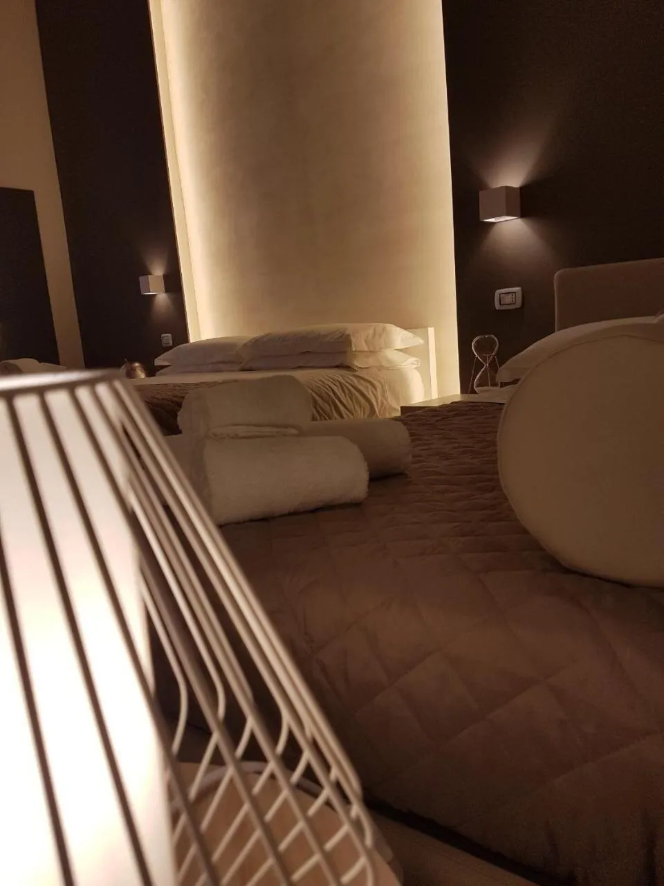 Bed in La Banchina Holiday Rooms