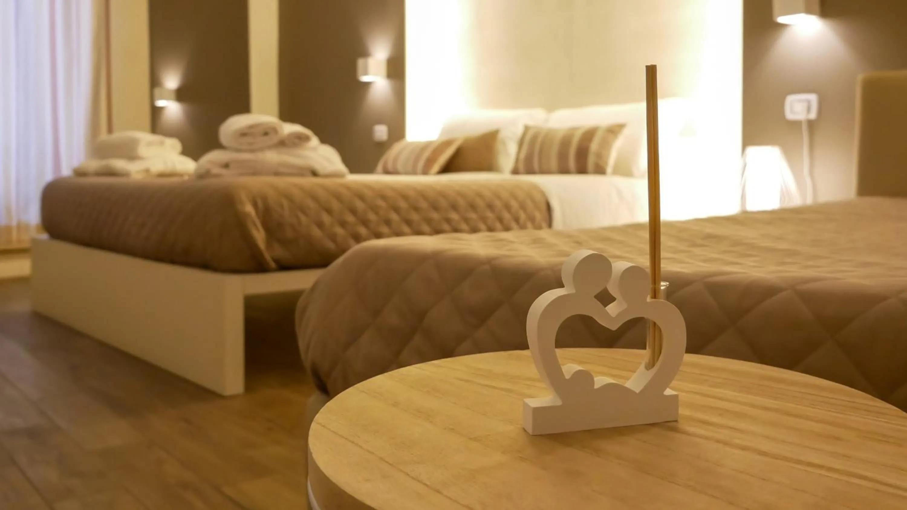 Bed in La Banchina Holiday Rooms