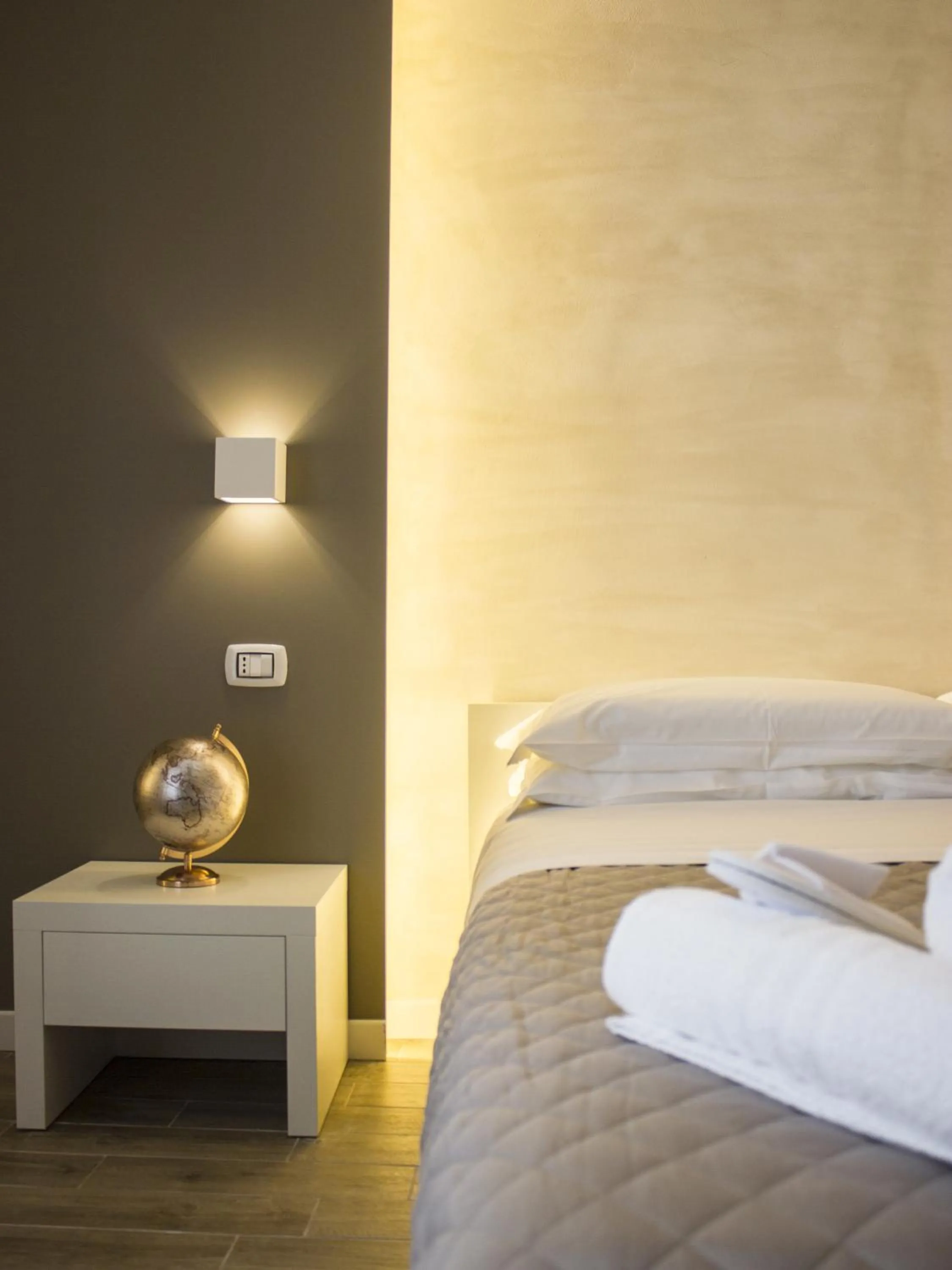 Bed in La Banchina Holiday Rooms