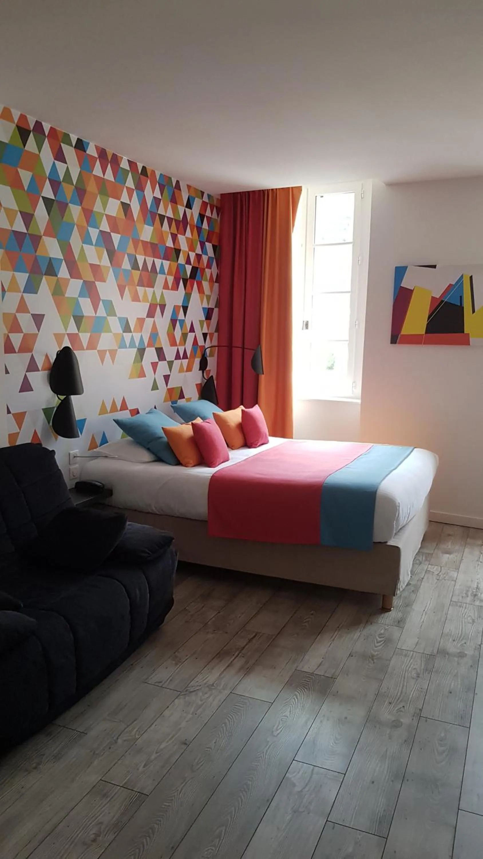 Seating area, Bed in Logis Hôtel des Deux Forts