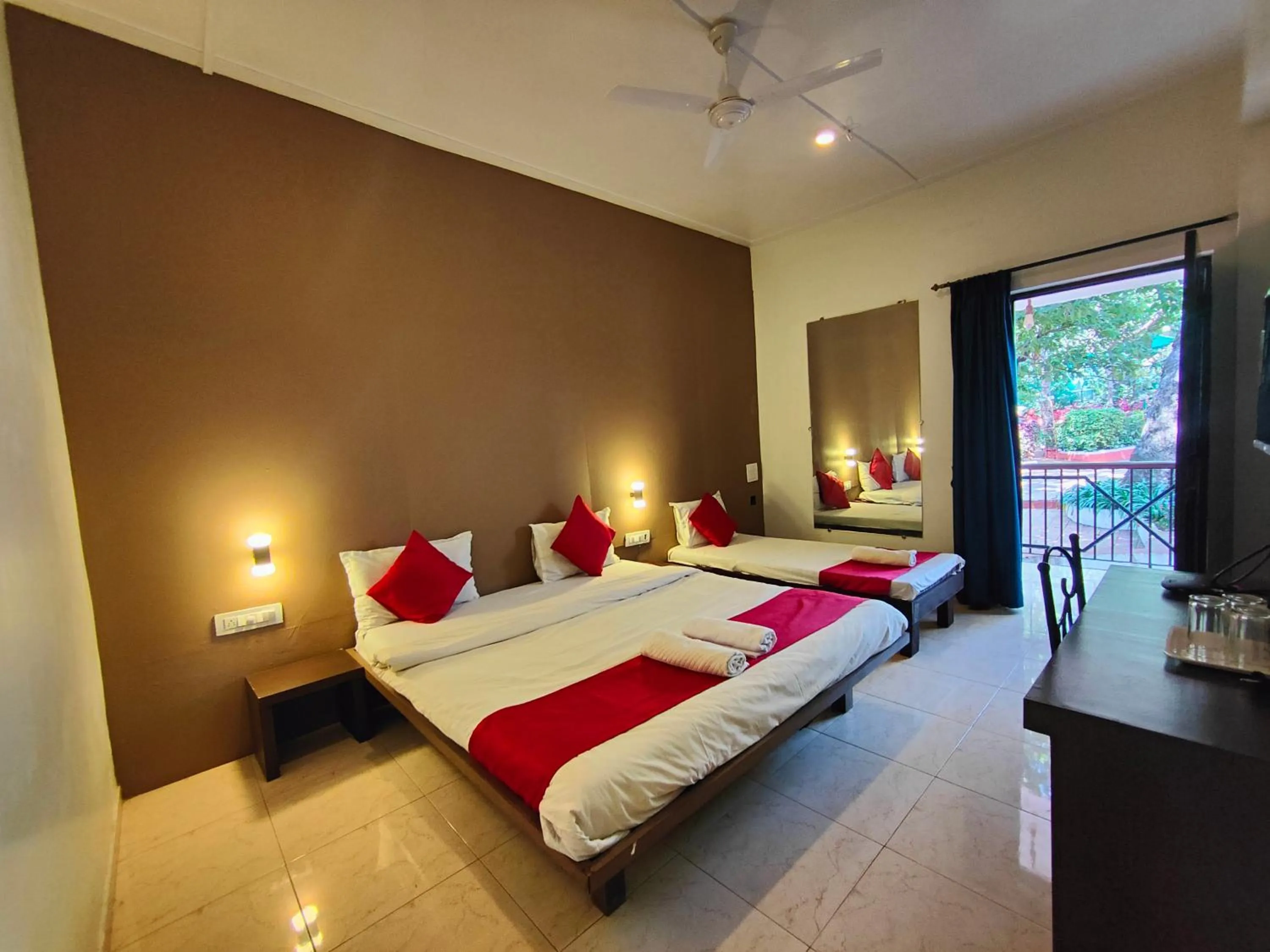 Photo of the whole room, Bed in Rain Raga Resort