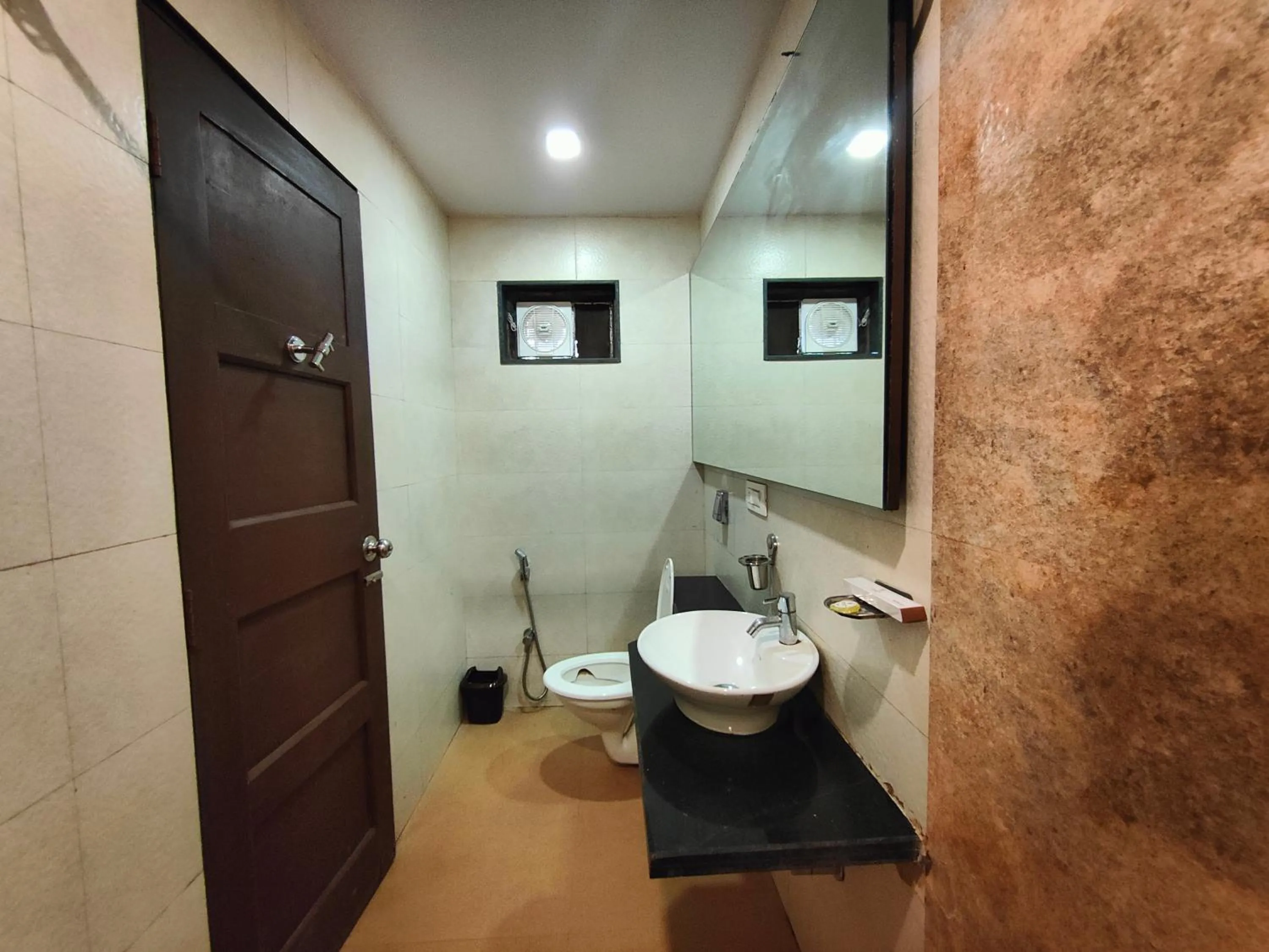 Toilet in Rain Raga Resort