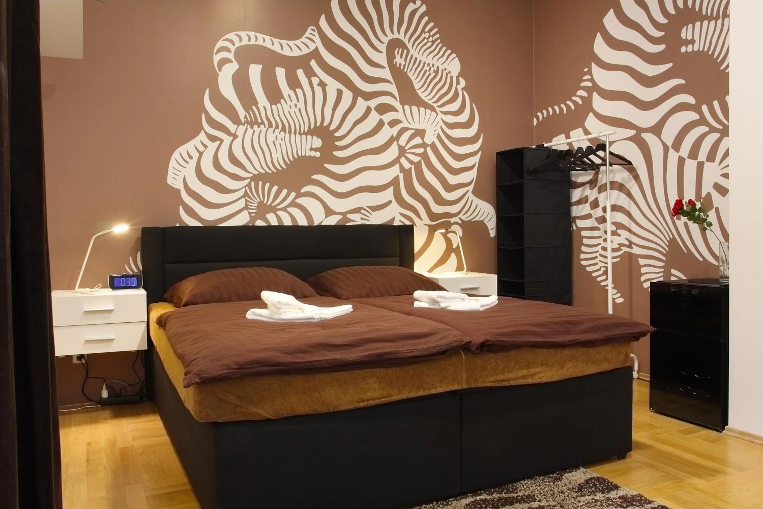 Bed in Atrium Apartments