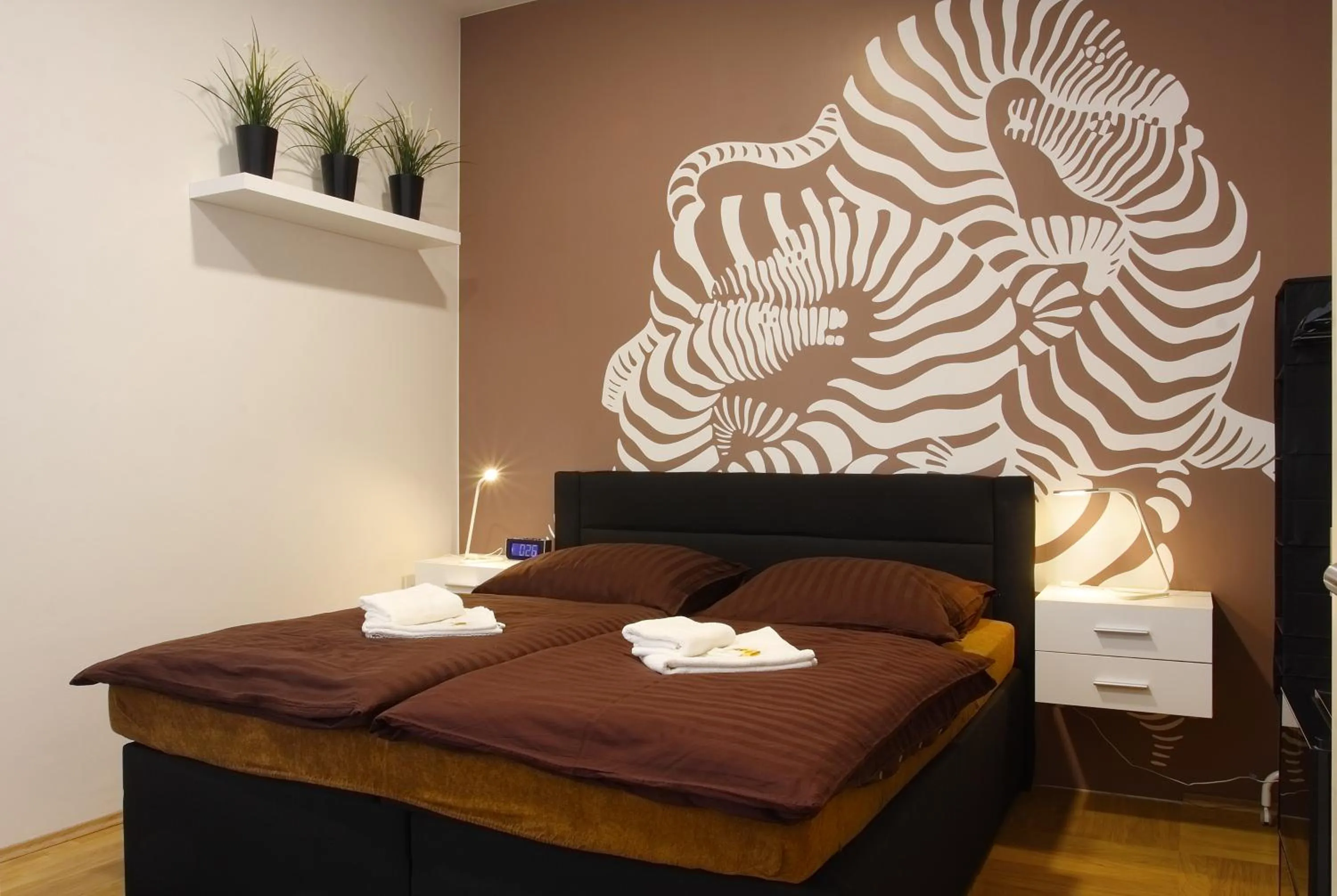 Bed in Atrium Apartments