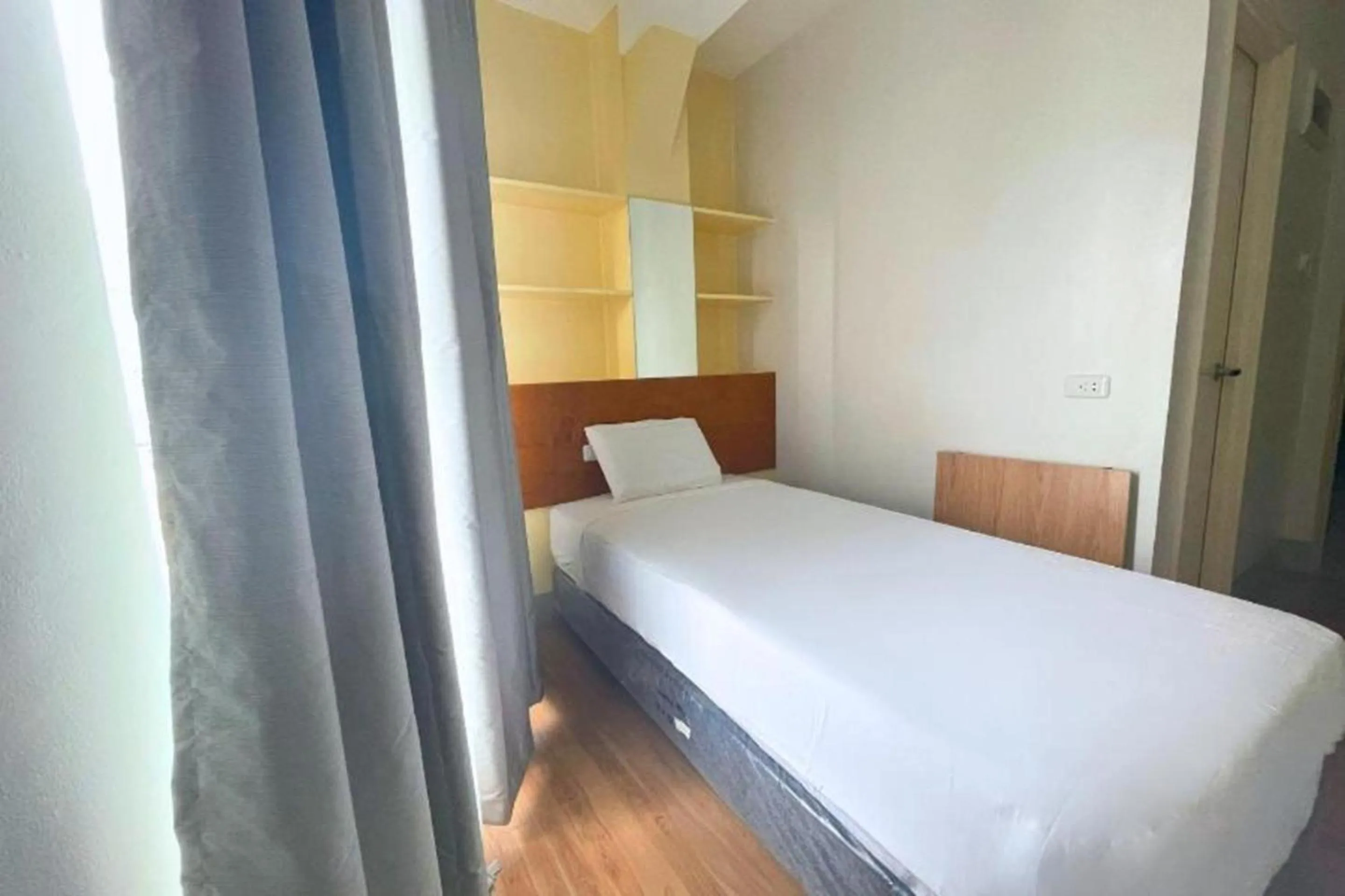 Bed in Almond Suites Cebu powered by Cocotel