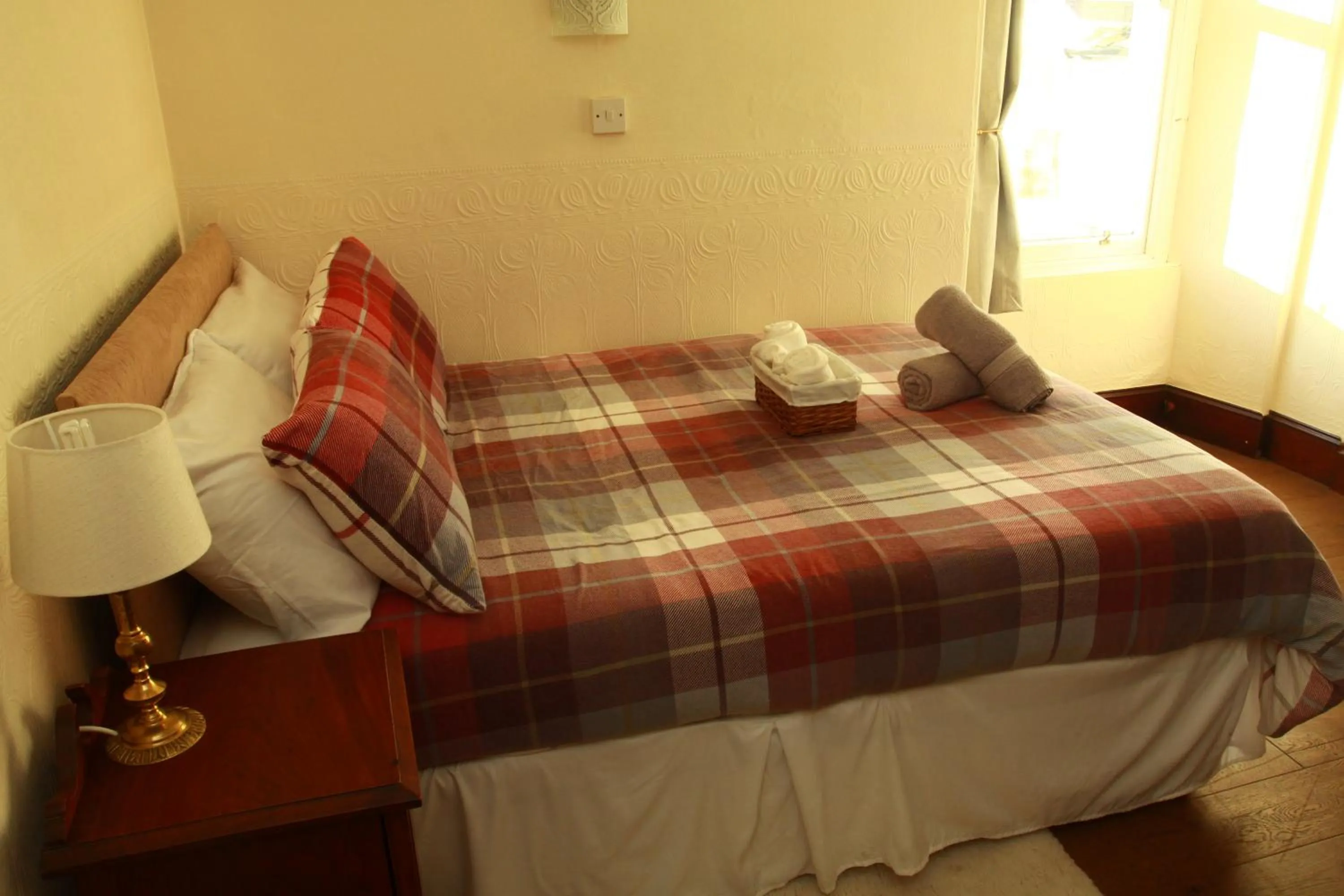 Bed in The Retreat Hotel