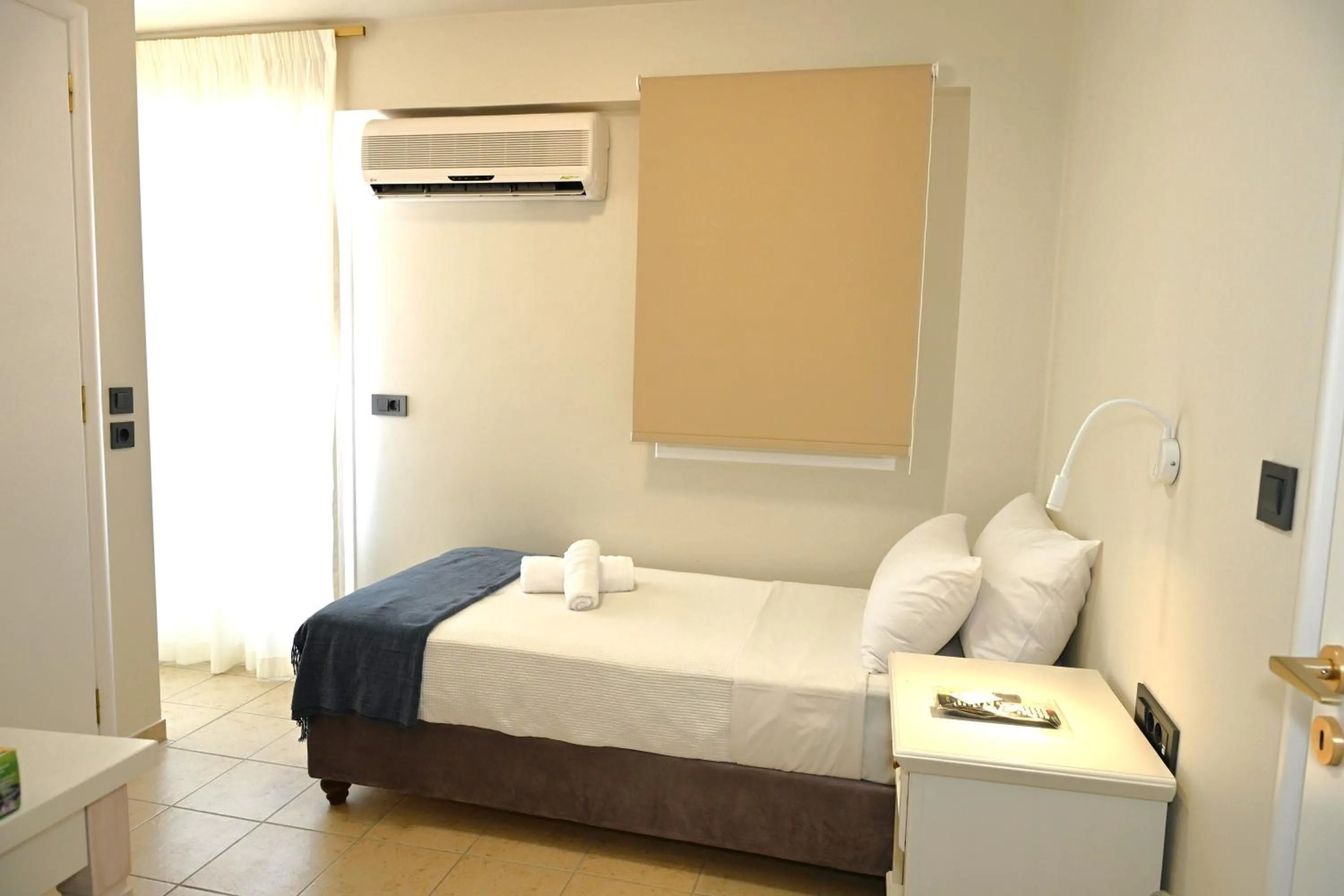 Photo of the whole room, Bed in Porto Nafplio