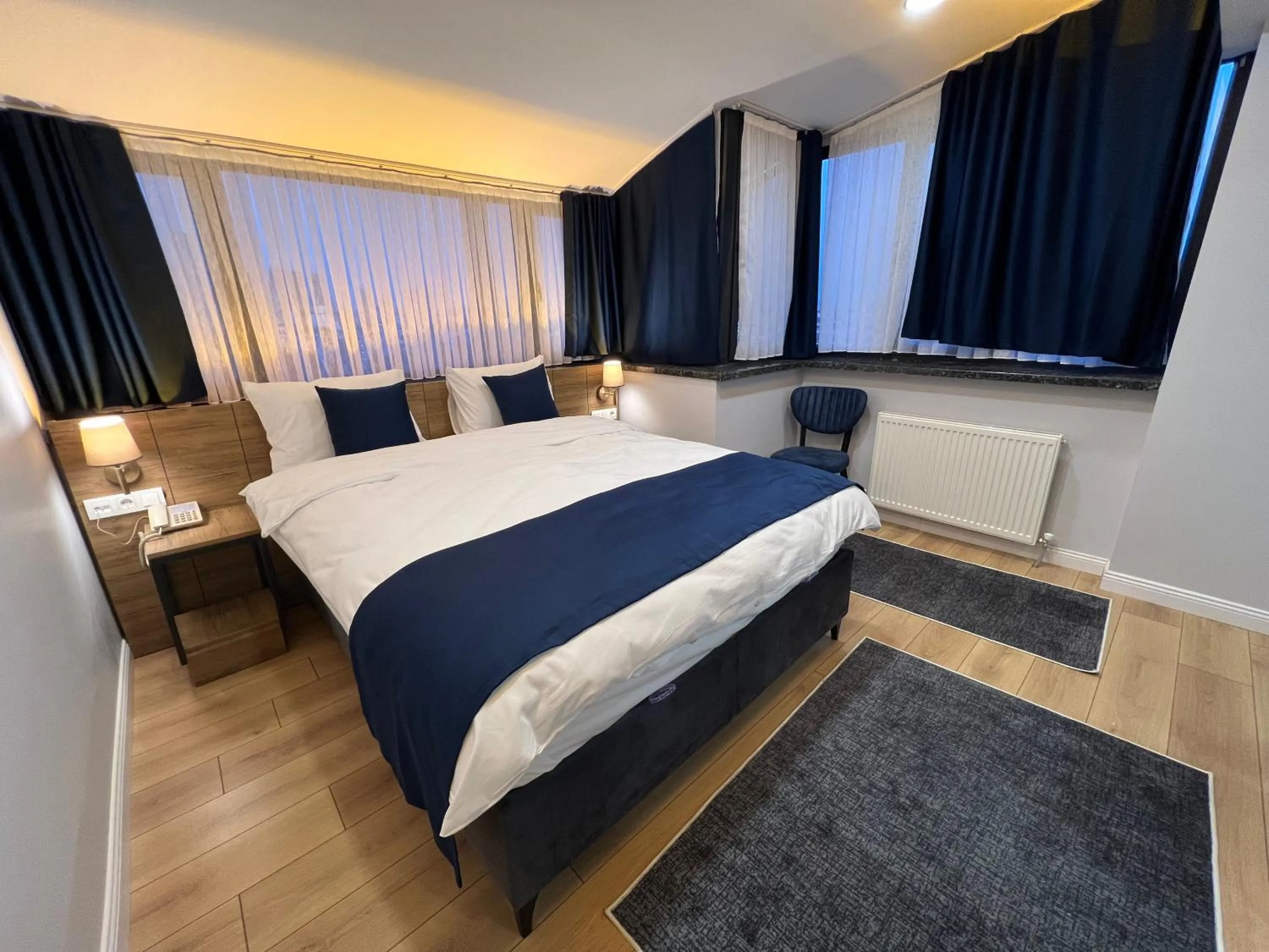 Bed in The Blue Suites