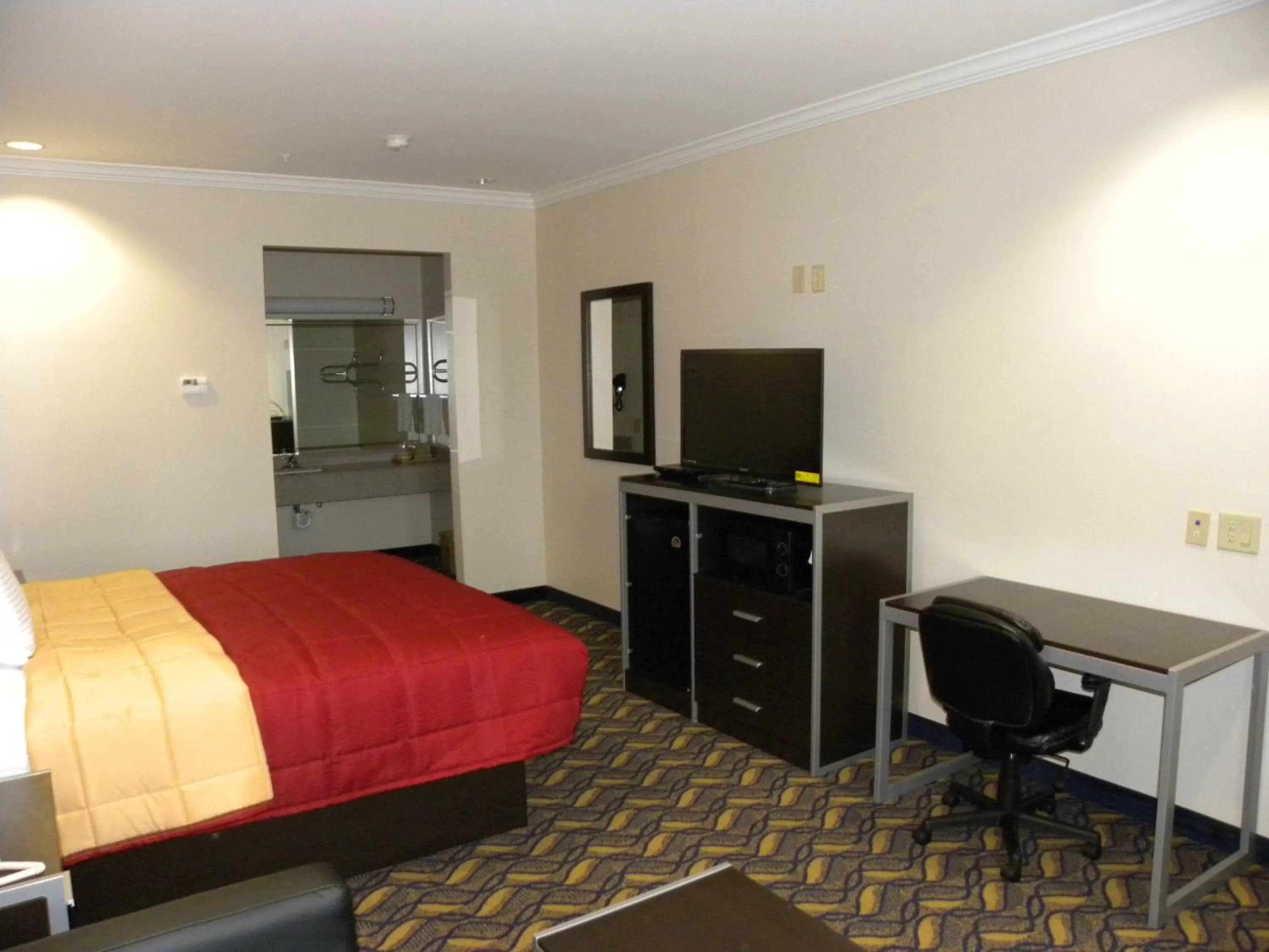 Bed in Palace Inn Kingwood