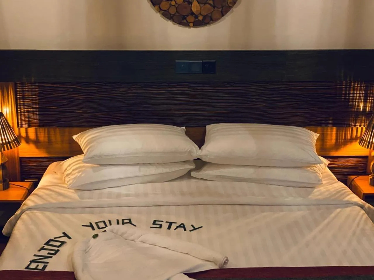 Bed in Sand Inn Residence