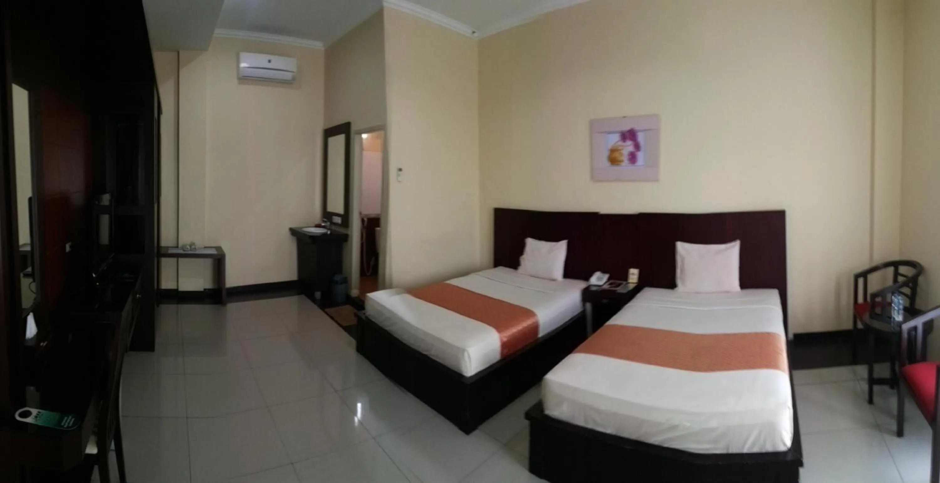 Bedroom in Jazz Hotel Palu