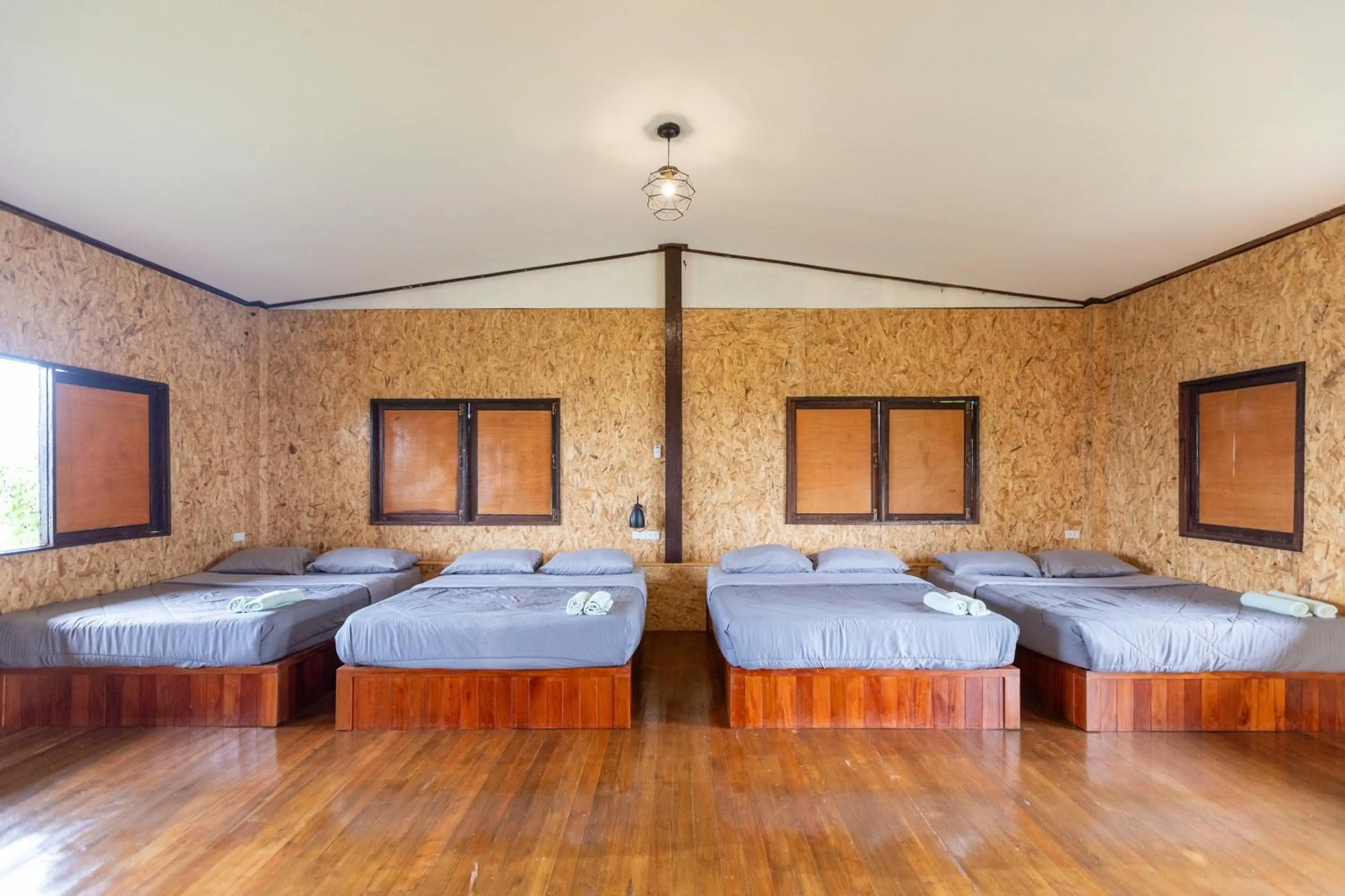 Photo of the whole room, Bed in Parinya Hill Homestay & Cafe Koh Larn