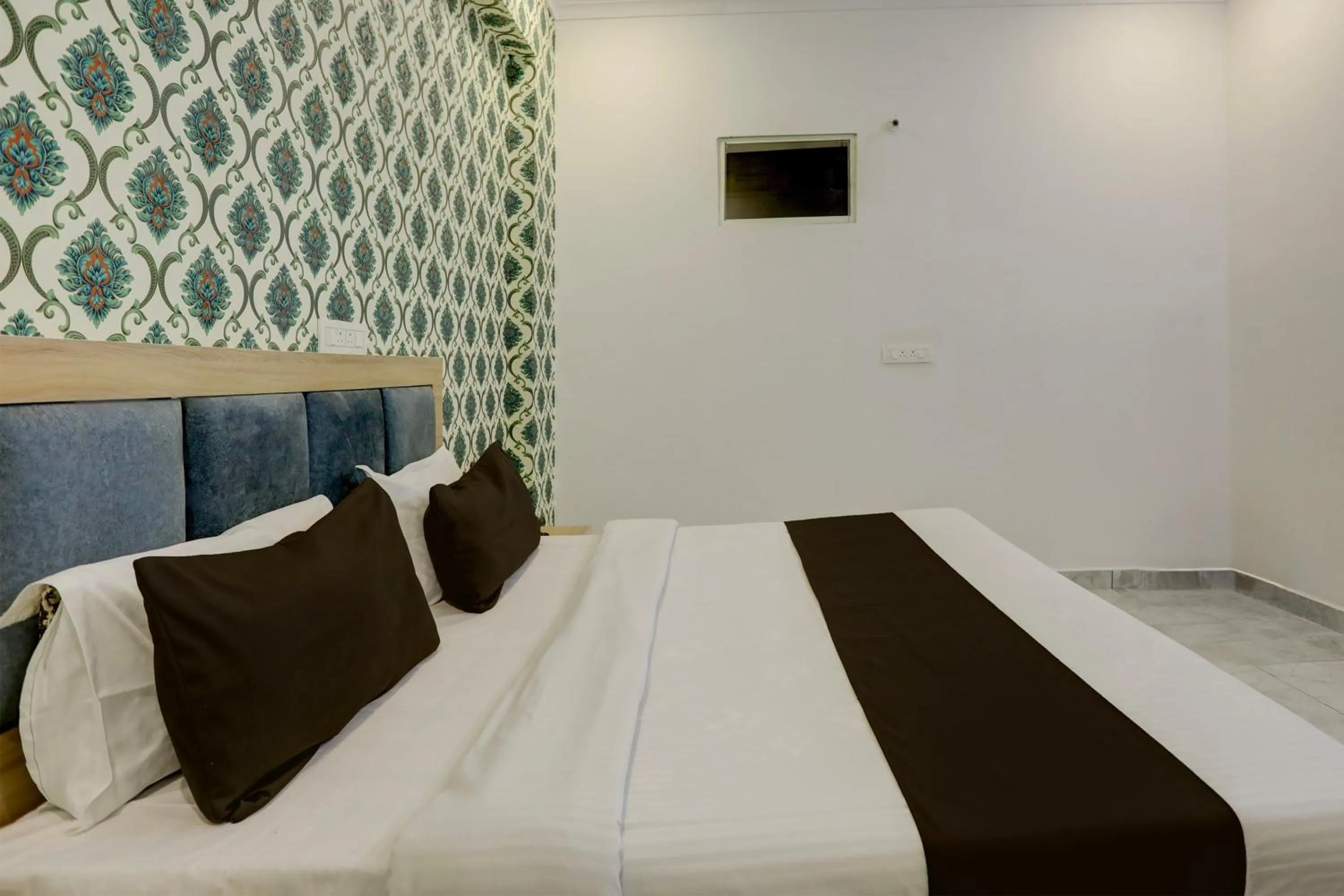 Bedroom in Hotel O BR INN