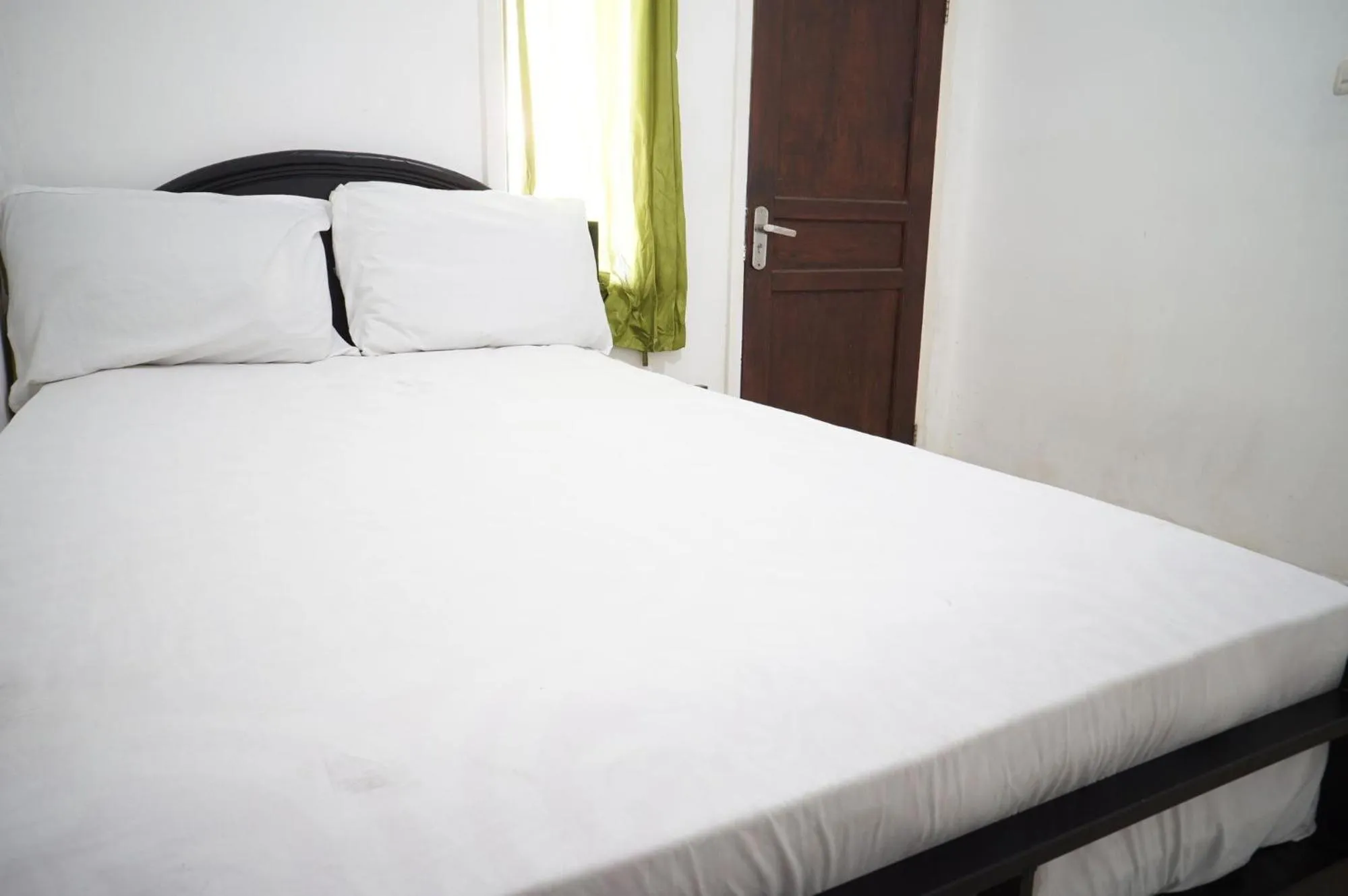 Bedroom, Bed in Hotel O Aero Kost Bu Lisa Syariah Near Pasar Tradisional Lawang