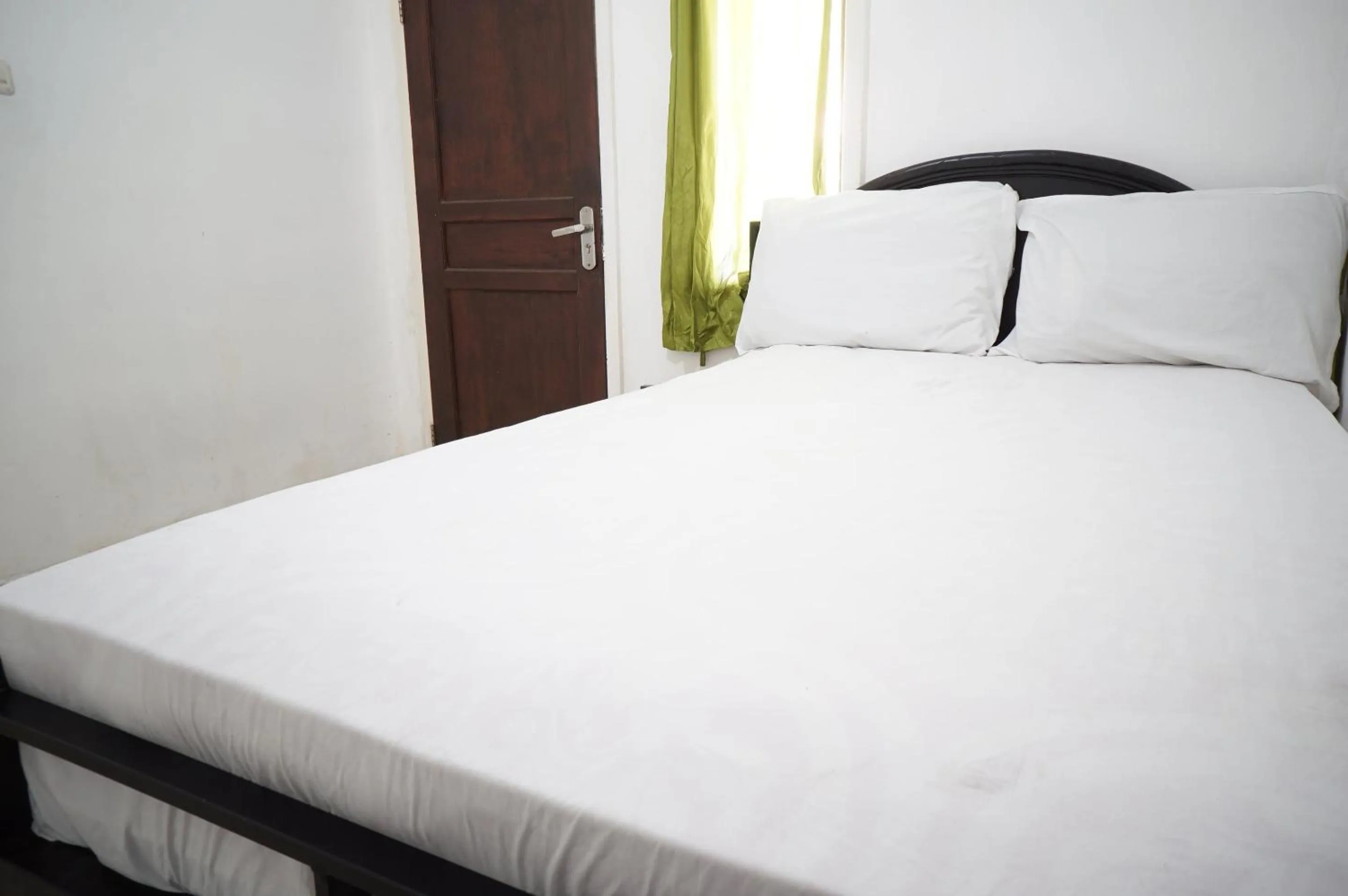 Bedroom, Bed in Hotel O Aero Kost Bu Lisa Syariah Near Pasar Tradisional Lawang