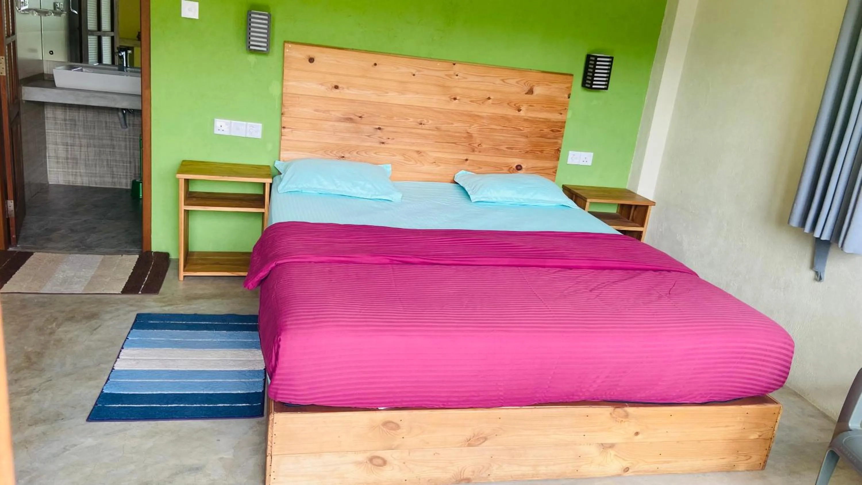 Bed in Raveena Guest House