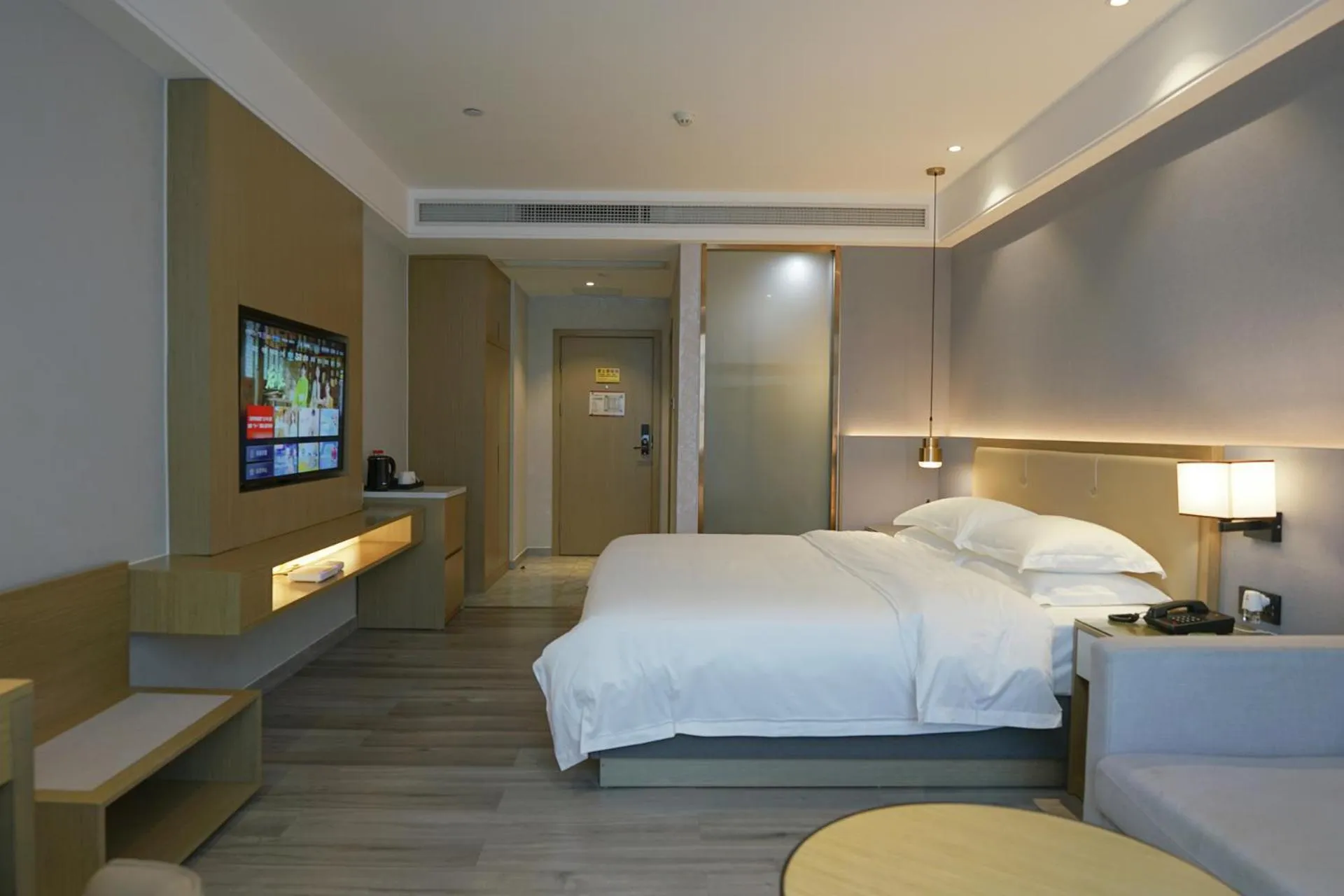 Bed in Paco Hotel Guangzhou North Railway Station