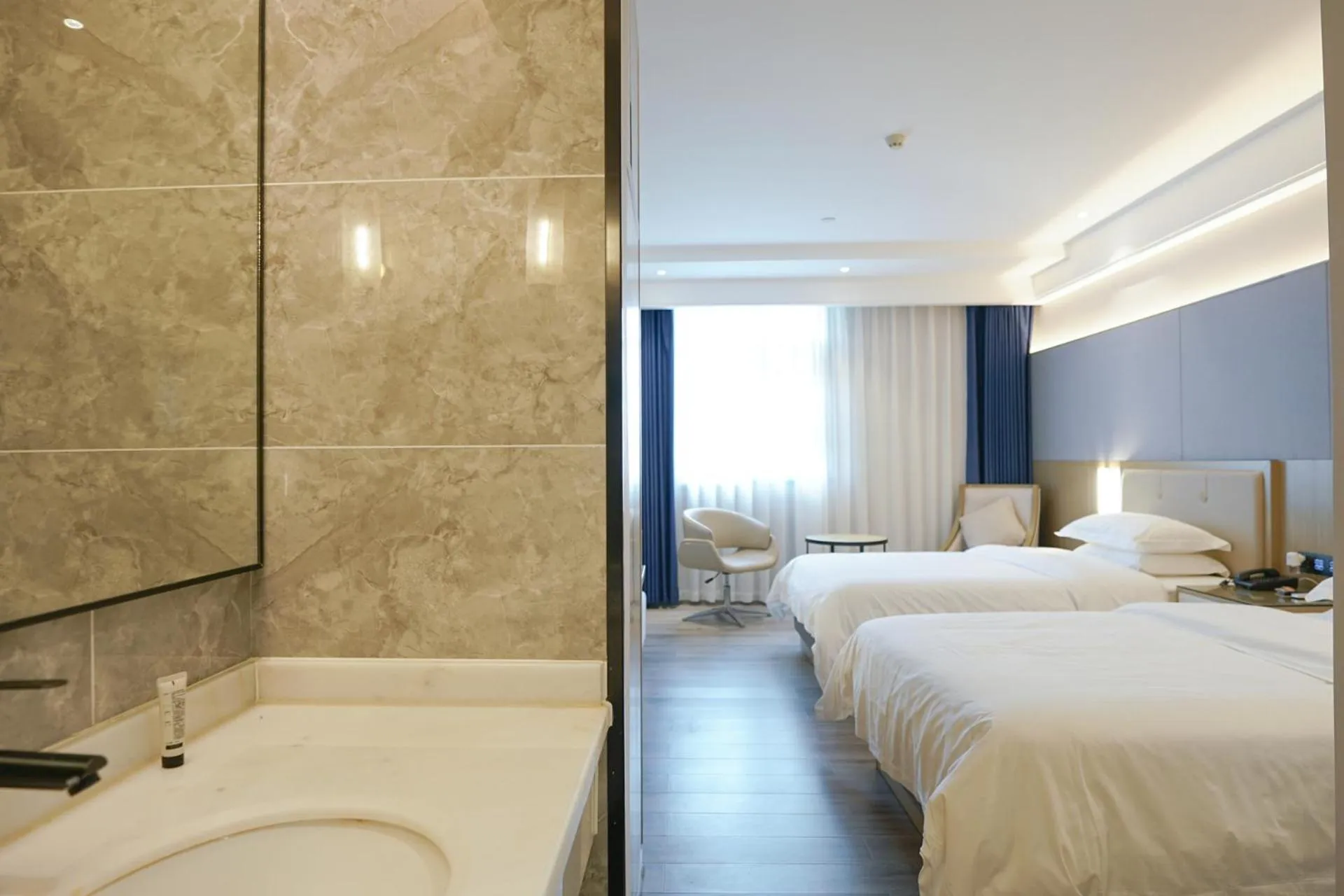 Photo of the whole room, Bed in Paco Hotel Guangzhou North Railway Station