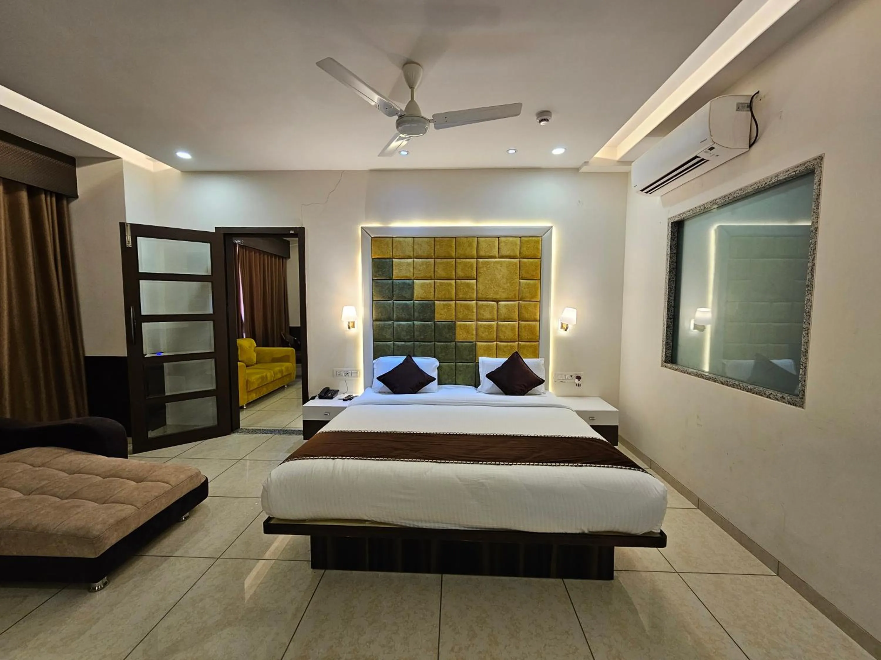 Bed in Hotel Grand Darshan Vadodara